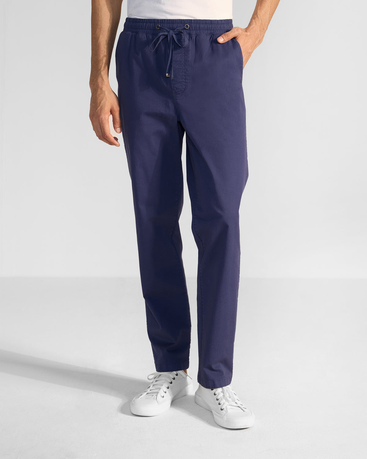 Navy Pravah Trousers with an elastic drawstring waist and straight legs.