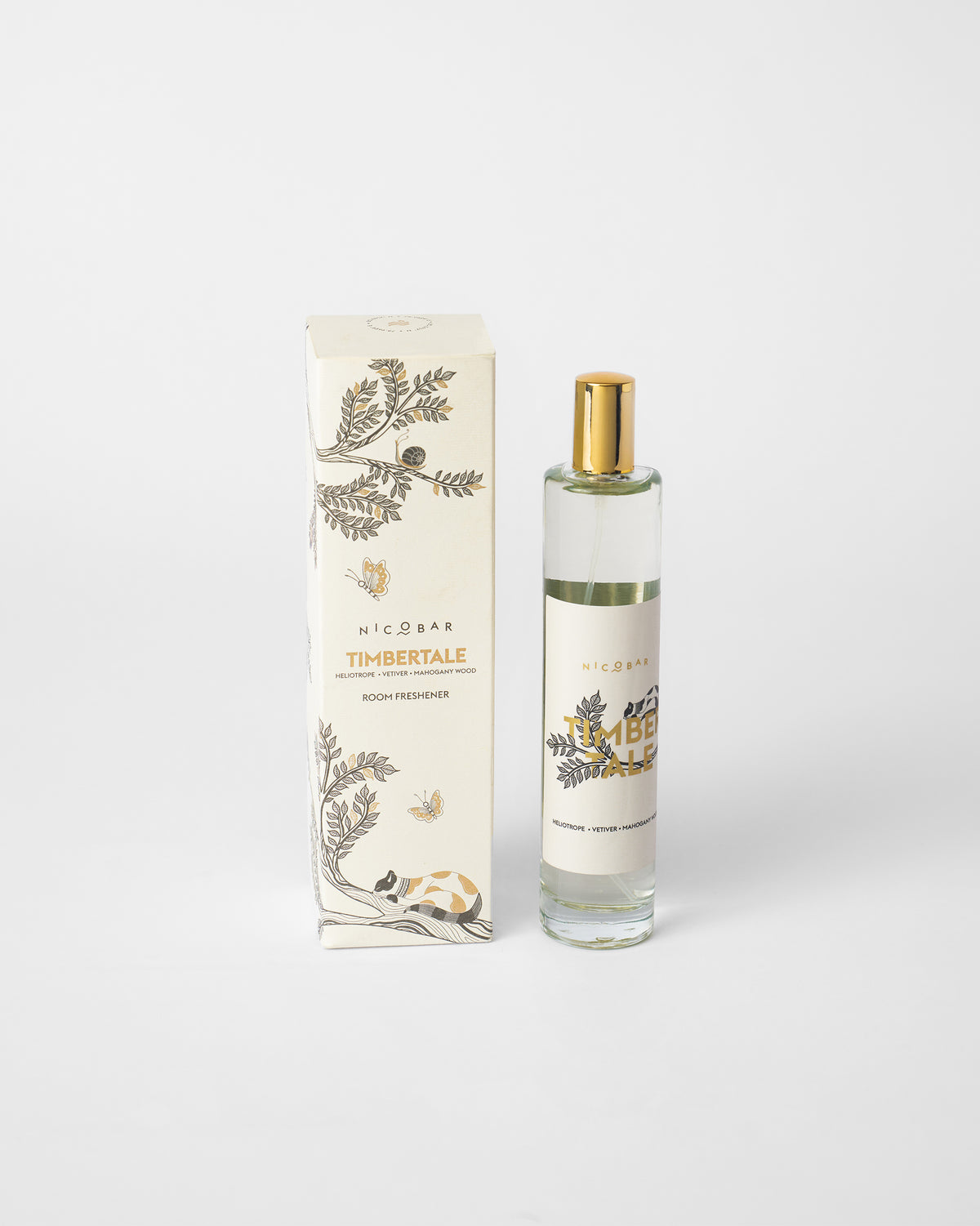 Timbertale Room Spray bottle with its gold spray cap beside its box.