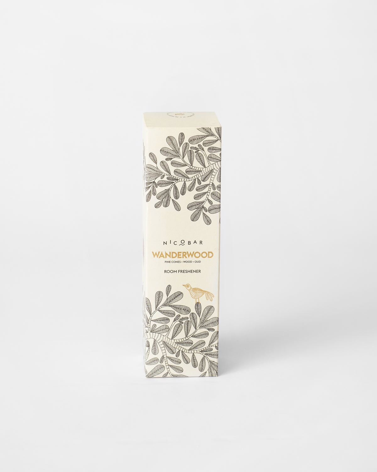 Box for the Wanderwood Room Spray with a leaf pattern and gold bird.