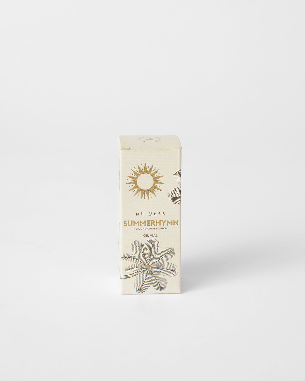 Summerhymn oil vial cream gift box with gold sun and palm leaf.