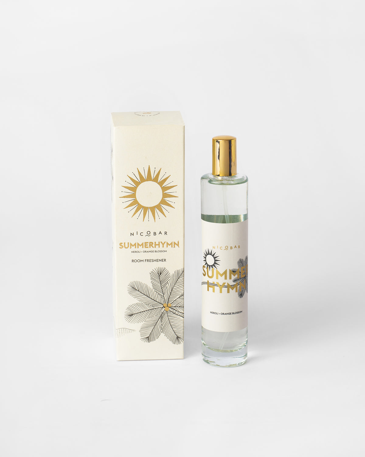 Summerhymn Room Spray bottle with its gold spray cap beside its box.
