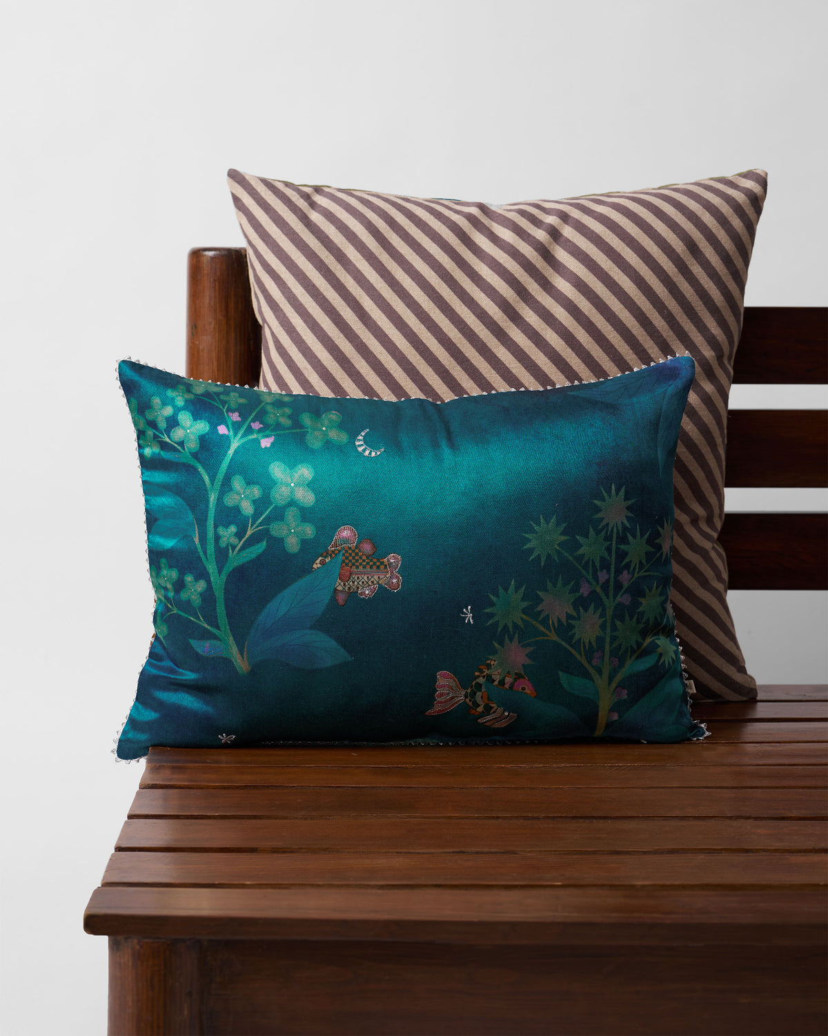 Fern Cushion Cover in deep teal with green flower stems.