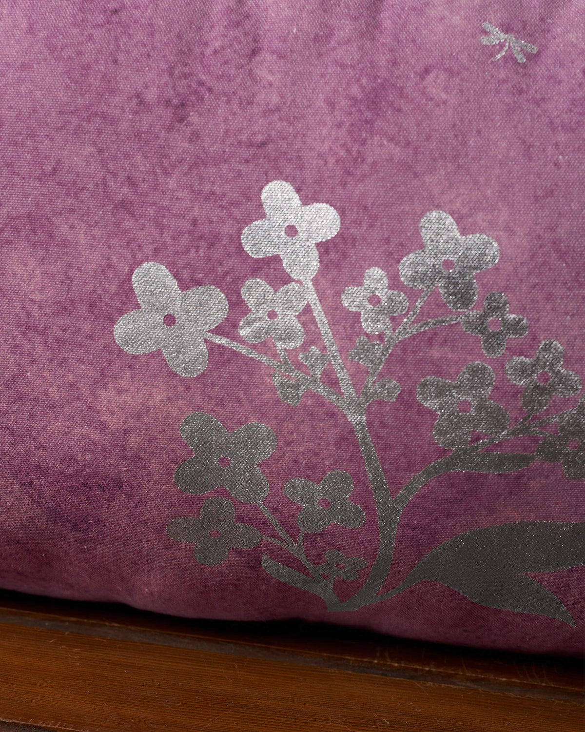 Close-up of Blooming Fern cushion cover showing silver blossom sprigs.