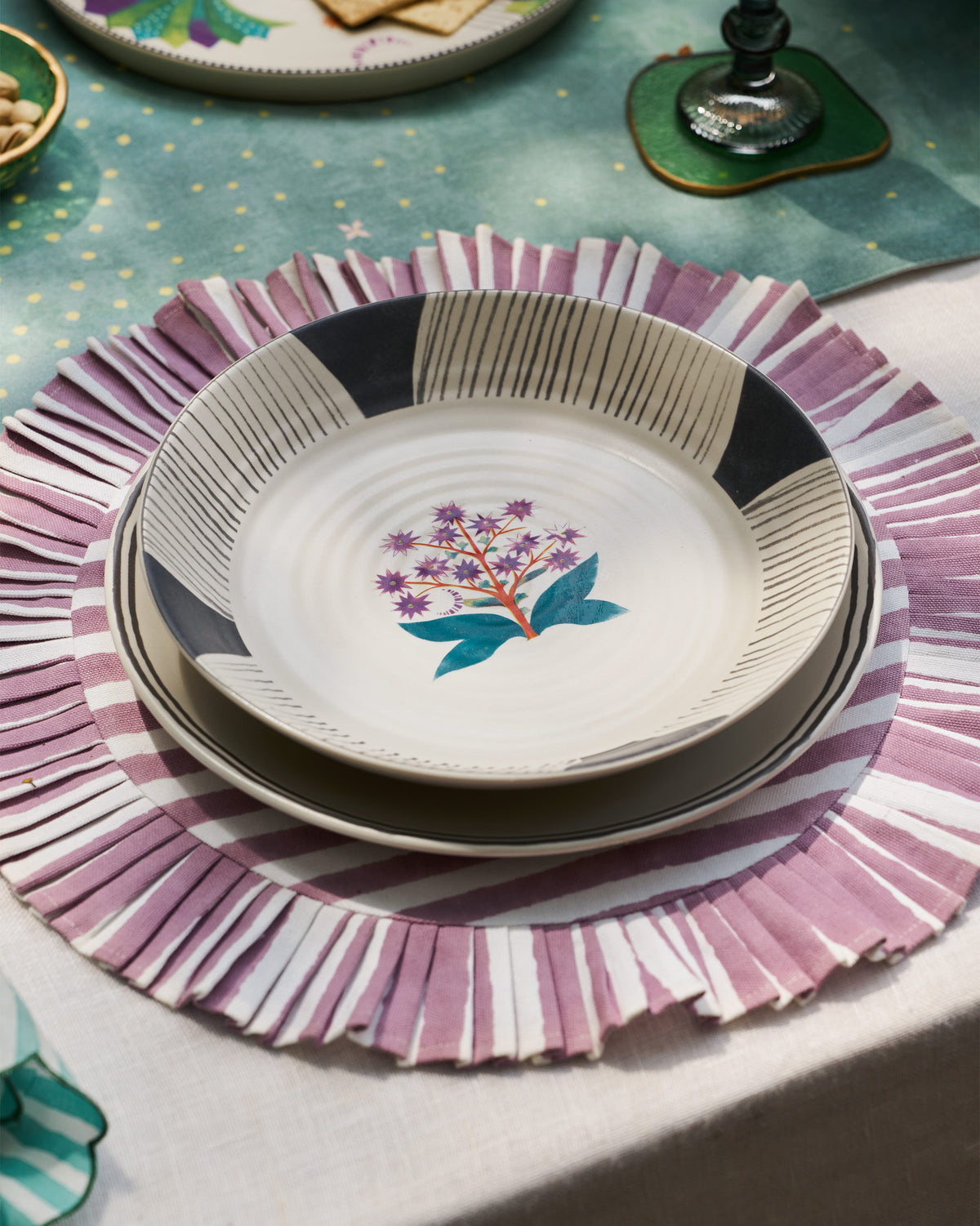 Mogra pasta plate stacked over a second plate.