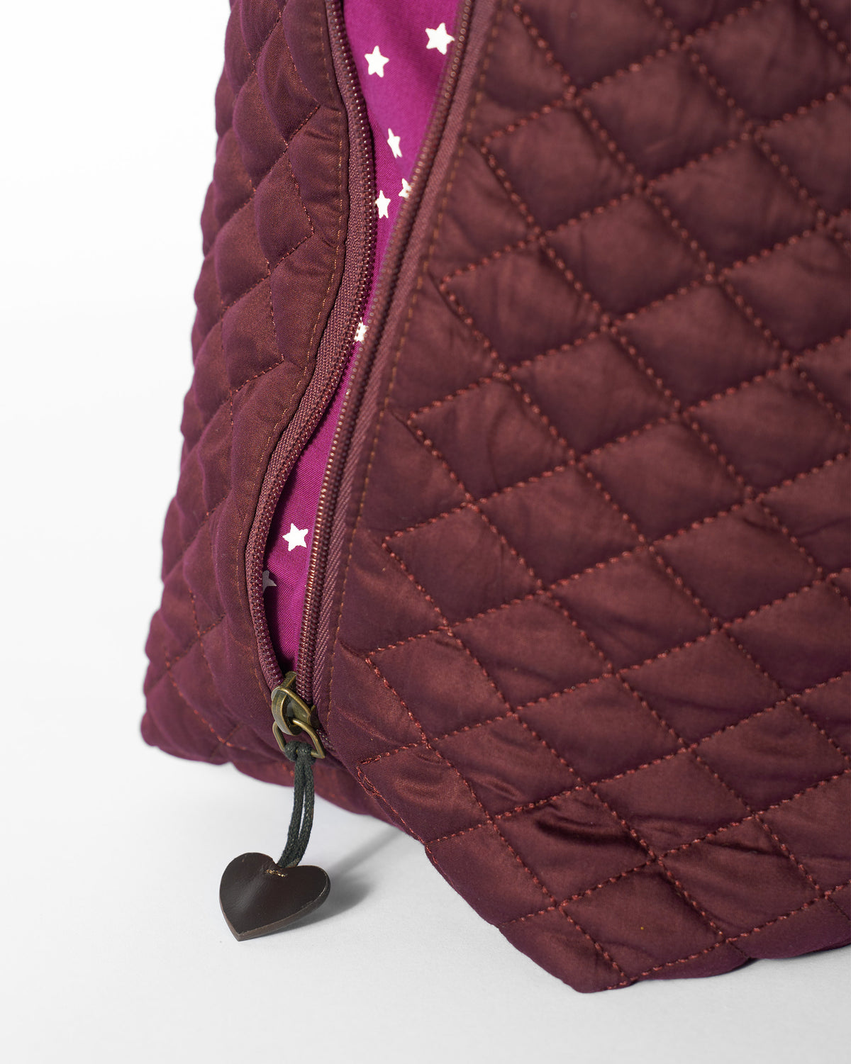 Close-up of the Farah Bag showing star lining and a heart pull.