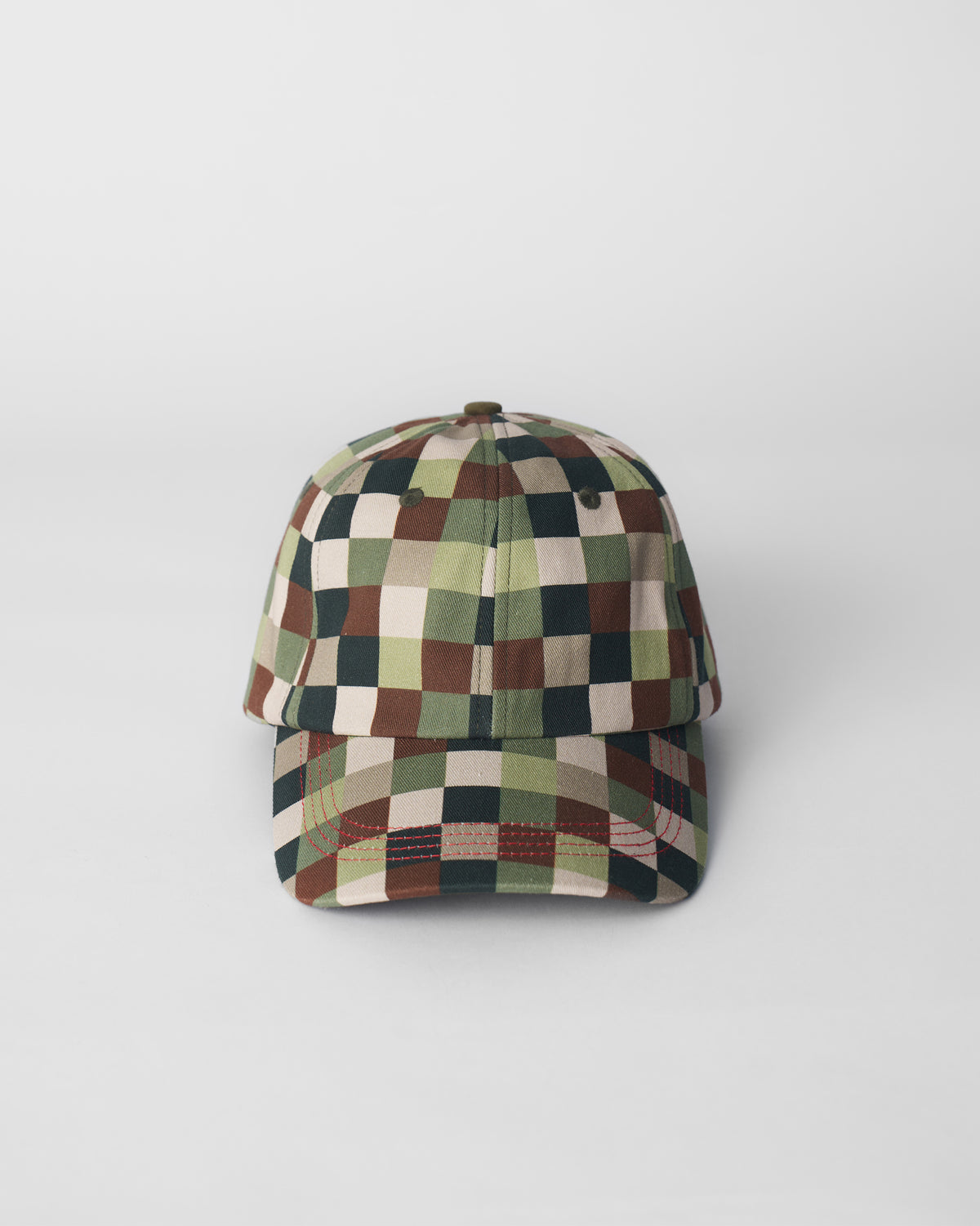 Front of an olive pixel-print baseball cap with red contrast stitching on the brim.