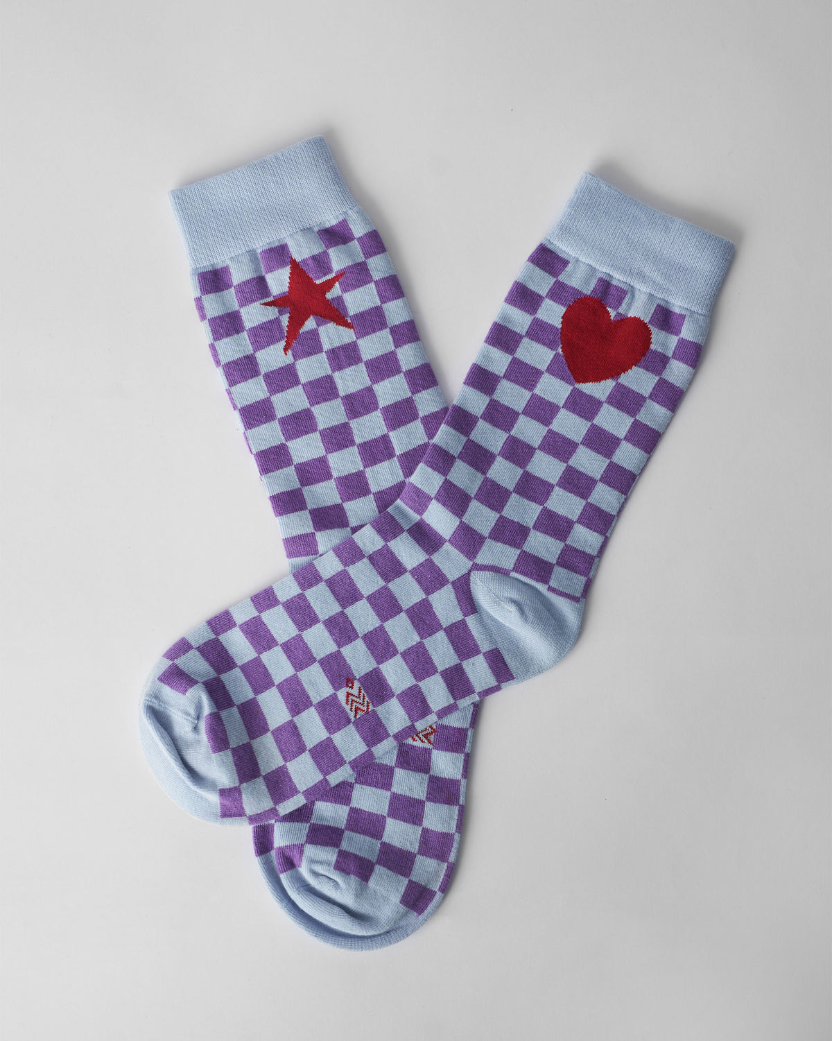 Ice blue and purple check Gingham Glow Socks laid flat.