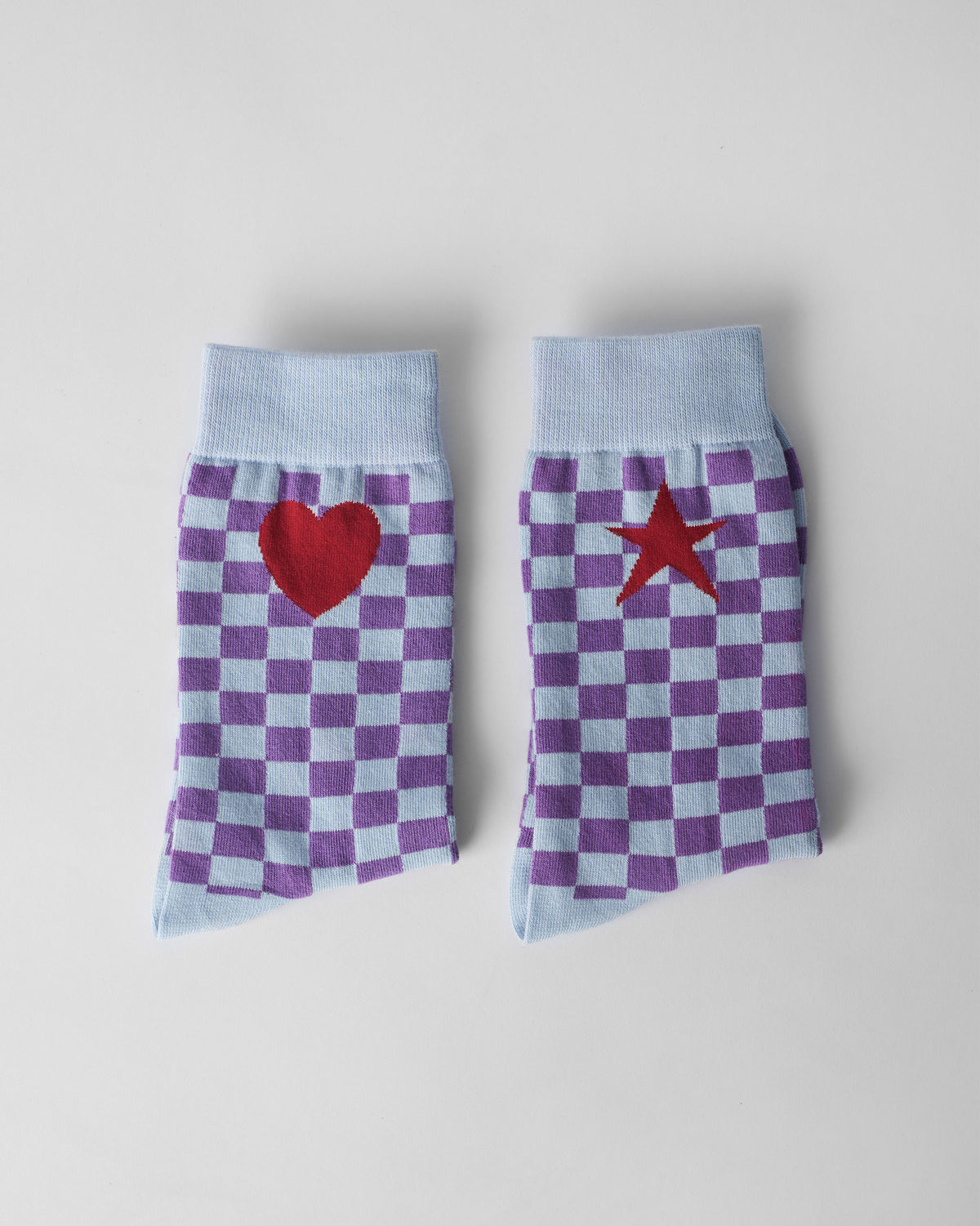 Gingham Glow Socks with a red heart and a red star.