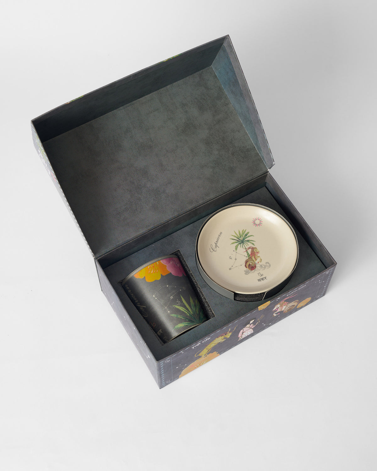 Nico Capricorn Gift Set mug and plate nested in the open gift box.