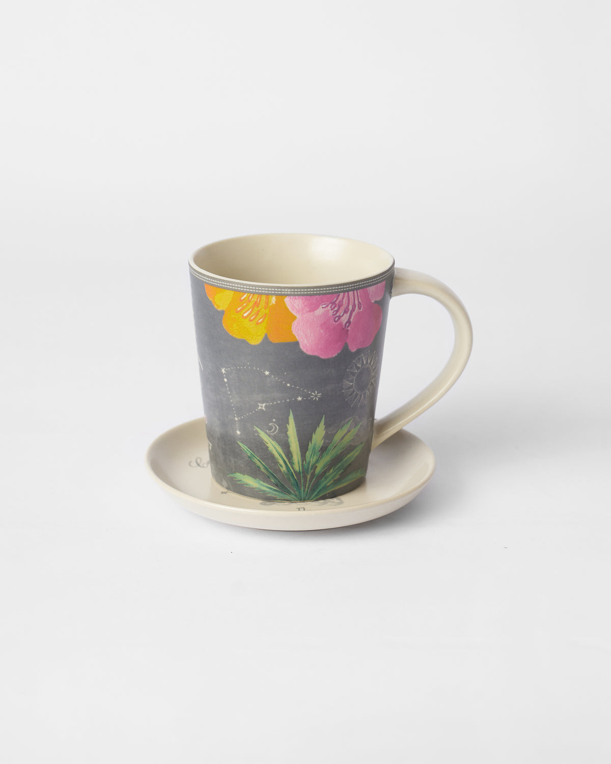 Nico Capricorn Gift Set mug on saucer with floral and constellation print.