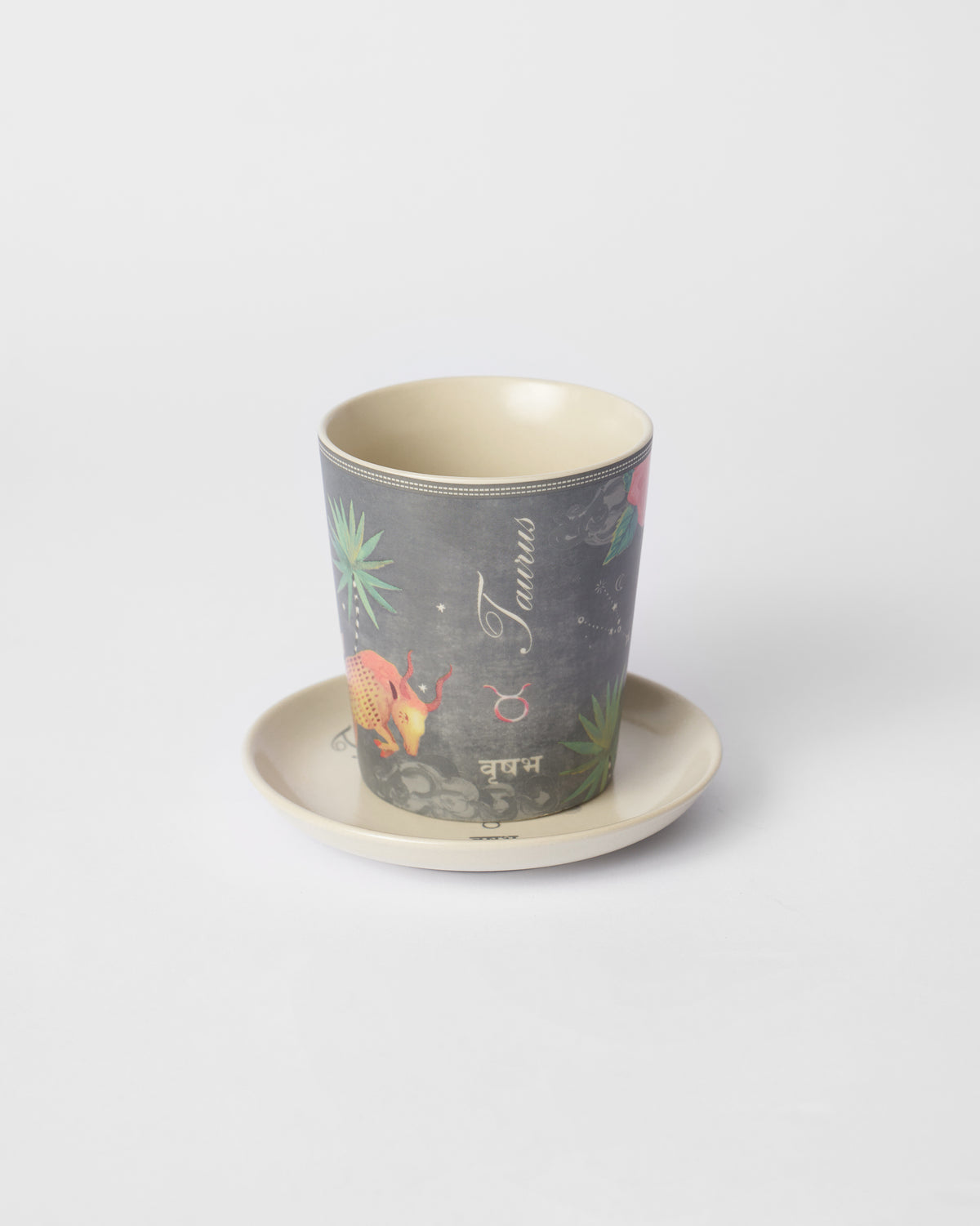 Nico Taurus mug on its tea plate showing Taurus and वृषभ lettering.