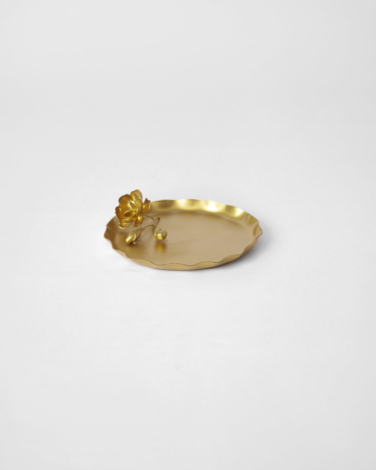 Grove Incense Holder with a gold flower at one edge of its dish.