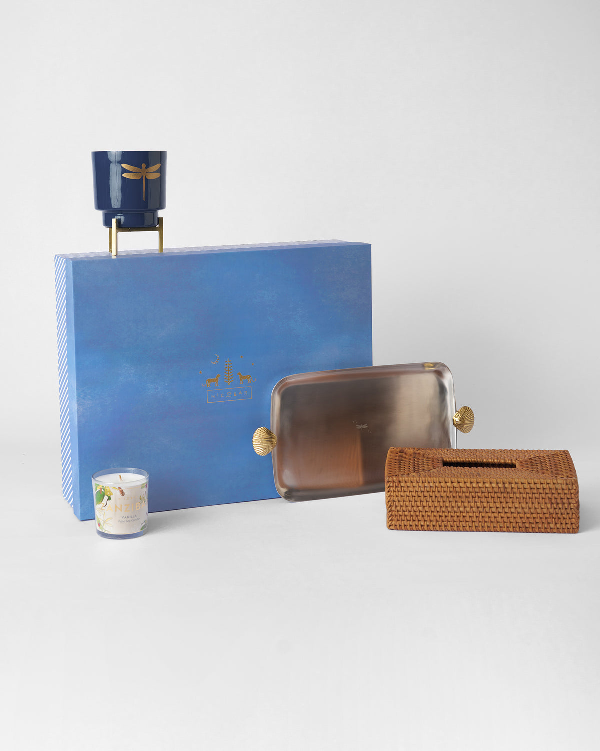 Laya gift set with blue Nicobar box, tray, candle, tissue box and planter.