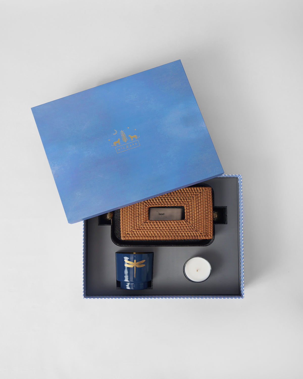 Laya gift set nestled in a blue Nicobar box with logo lid.