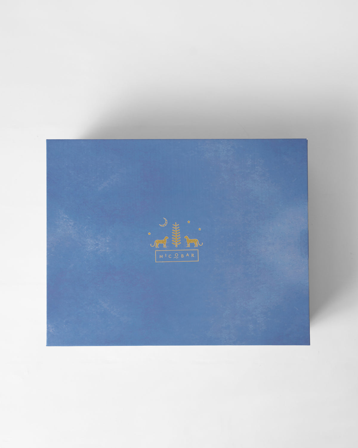 Closed blue Nicobar gift box for the Laya gift set.