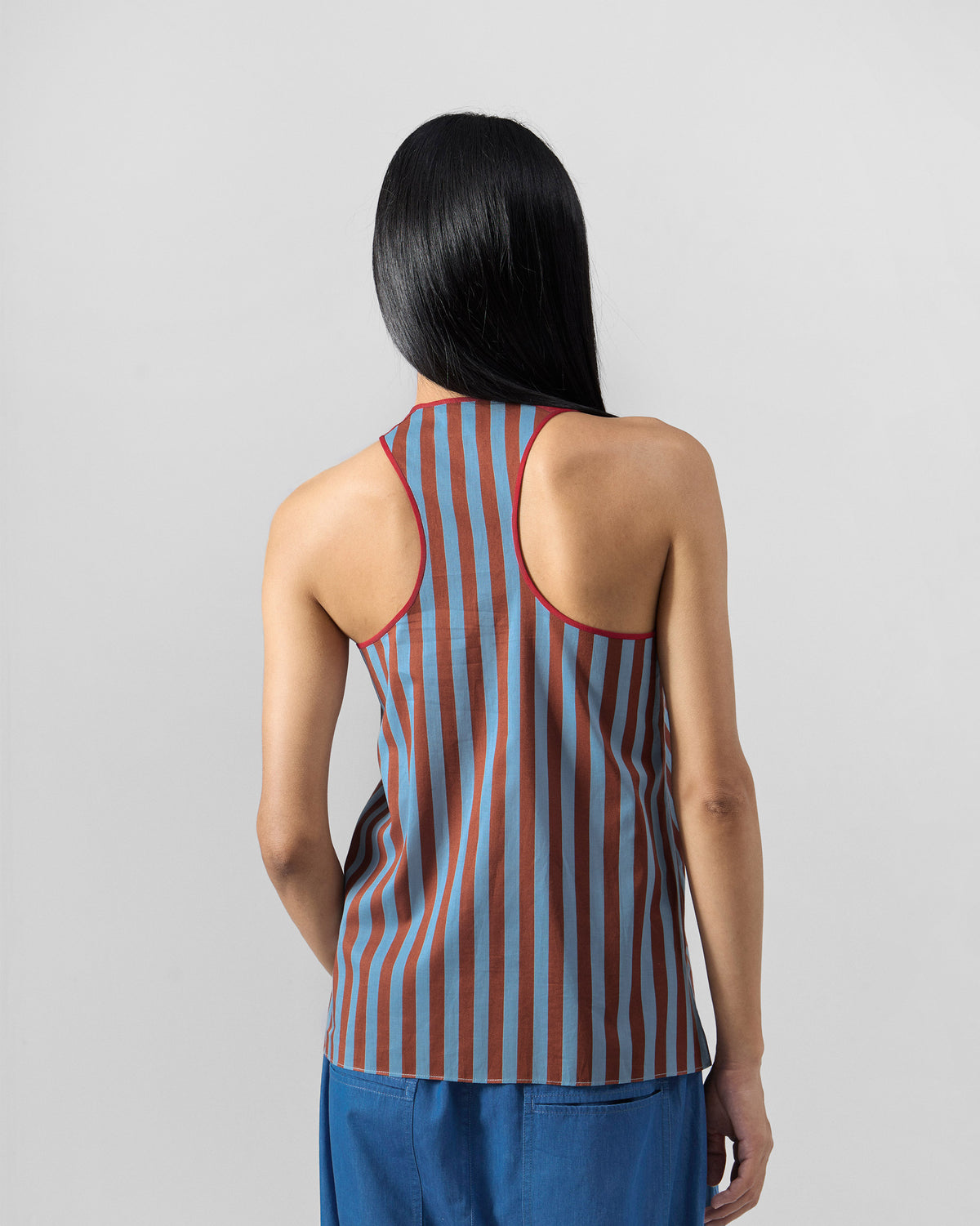 Back of a blue and brown striped Ukiyo racerback top.