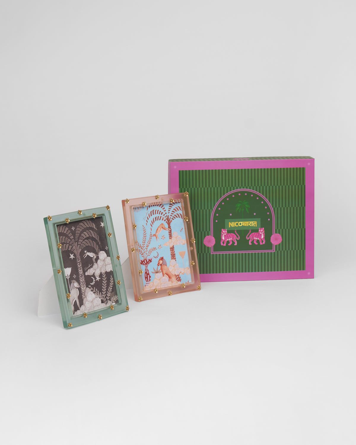 Memoir photo frame set of two in mint and blush with gold flower studs.