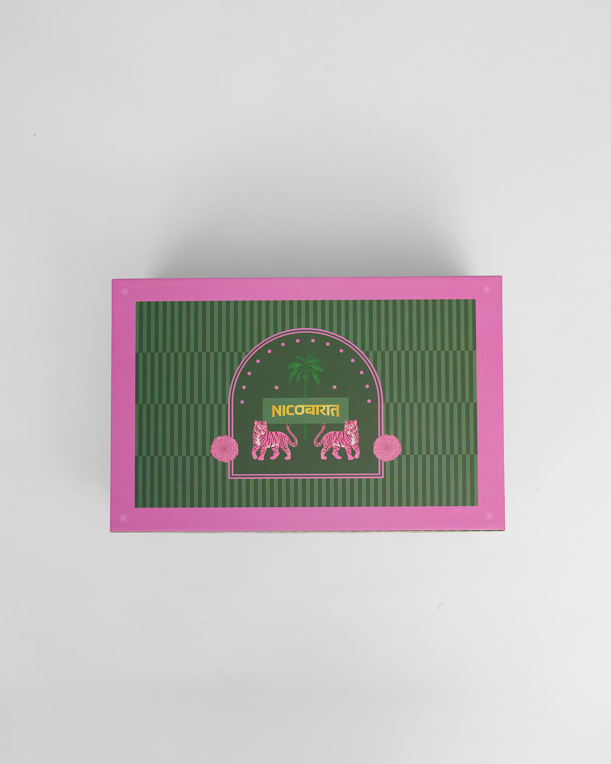 Pink and green Nicobarat gift box with tiger arch design.