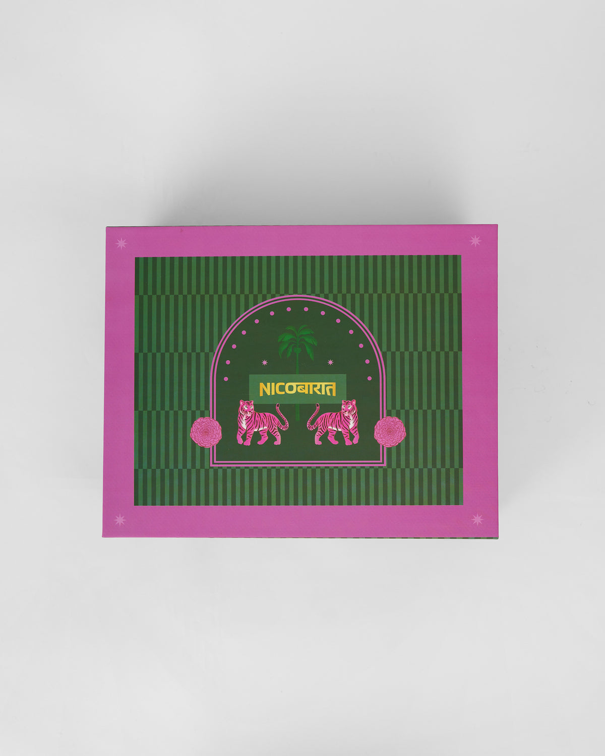 Overhead view of the Ember gift box lid with a pink tiger motif.