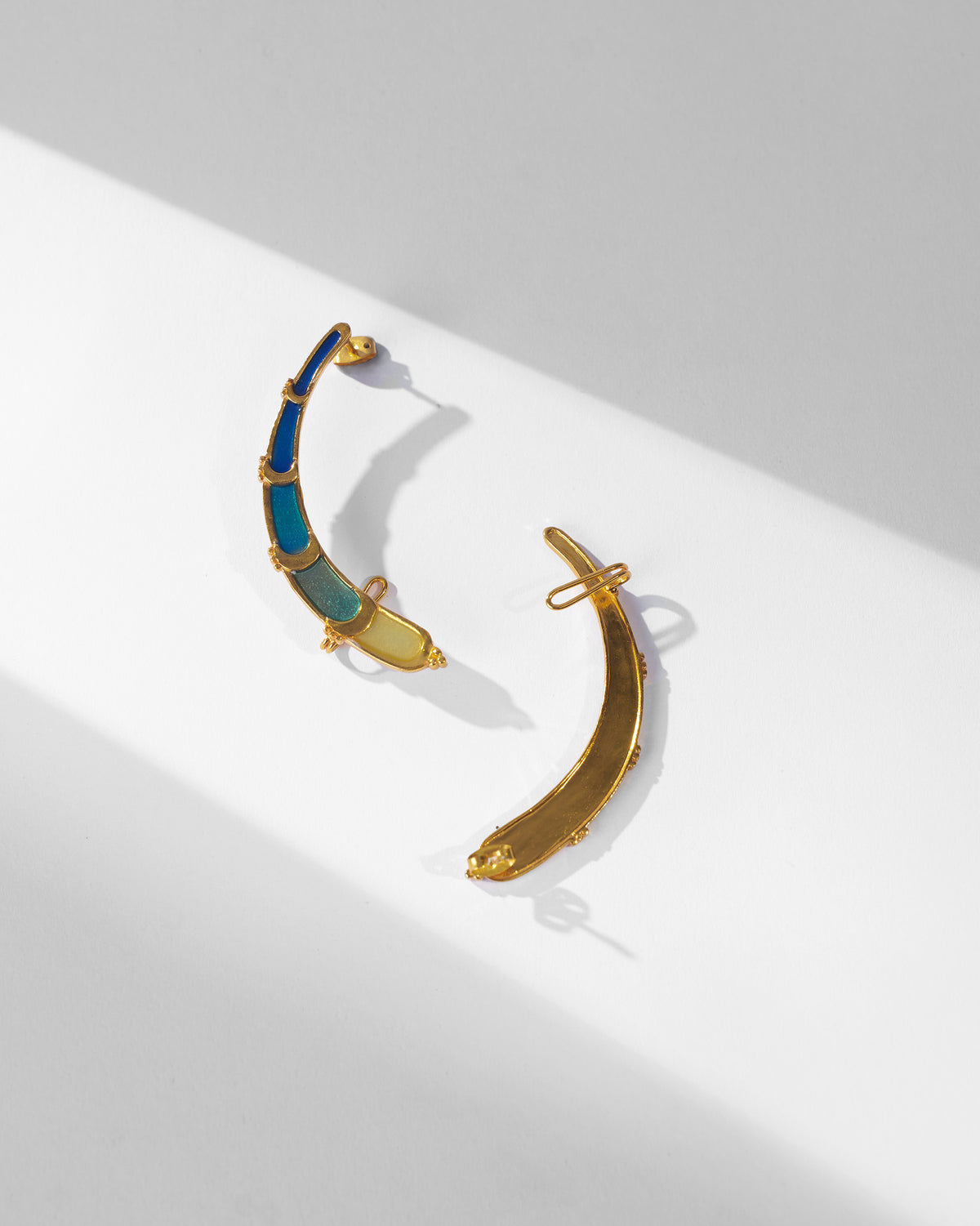 Gold Rising Moon enamel crescents showing front and fastening.