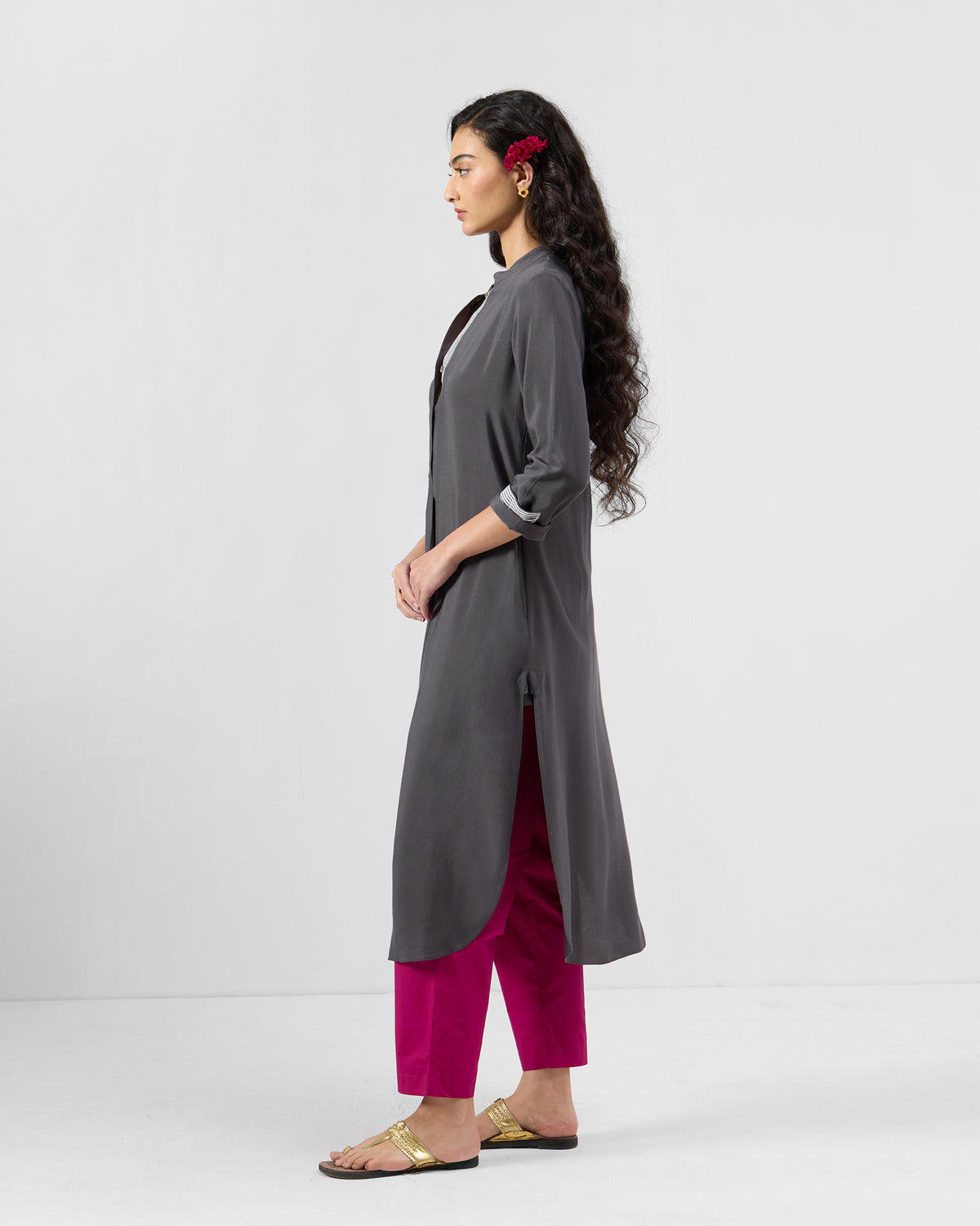 Side view of a charcoal silk-blend long kurta showing below-knee length and side slits.