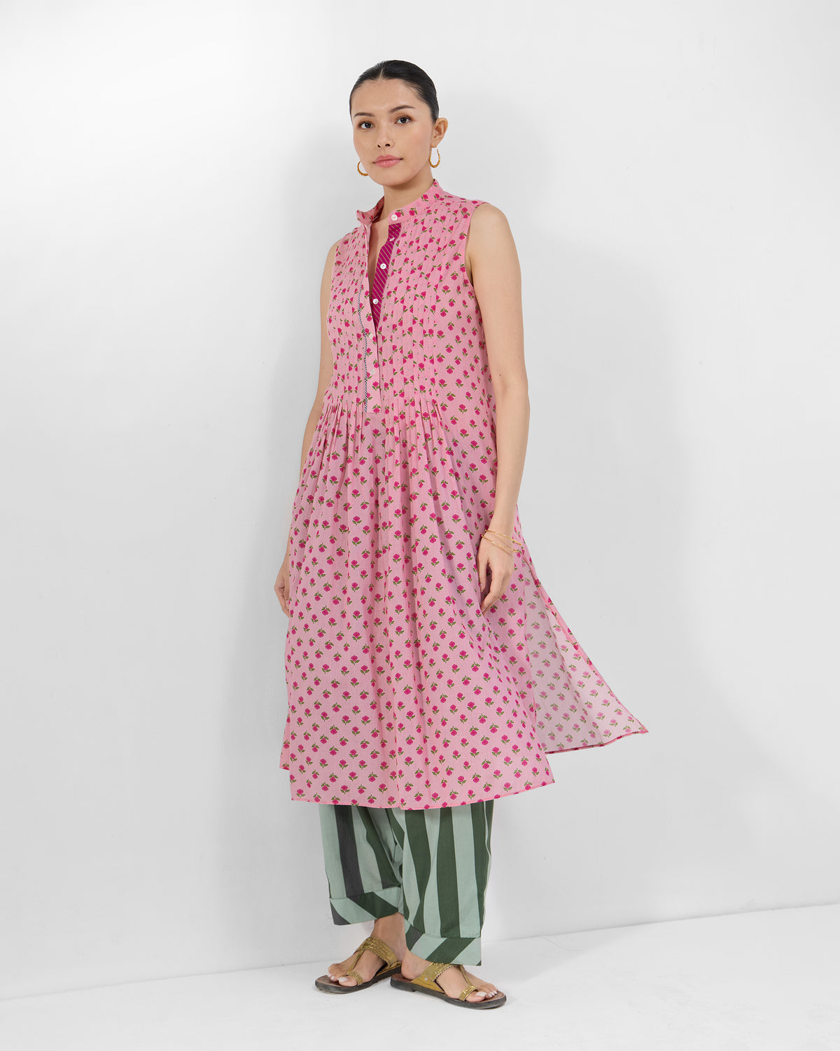 Person wearing a sleeveless pink floral Summer Fun kurta.