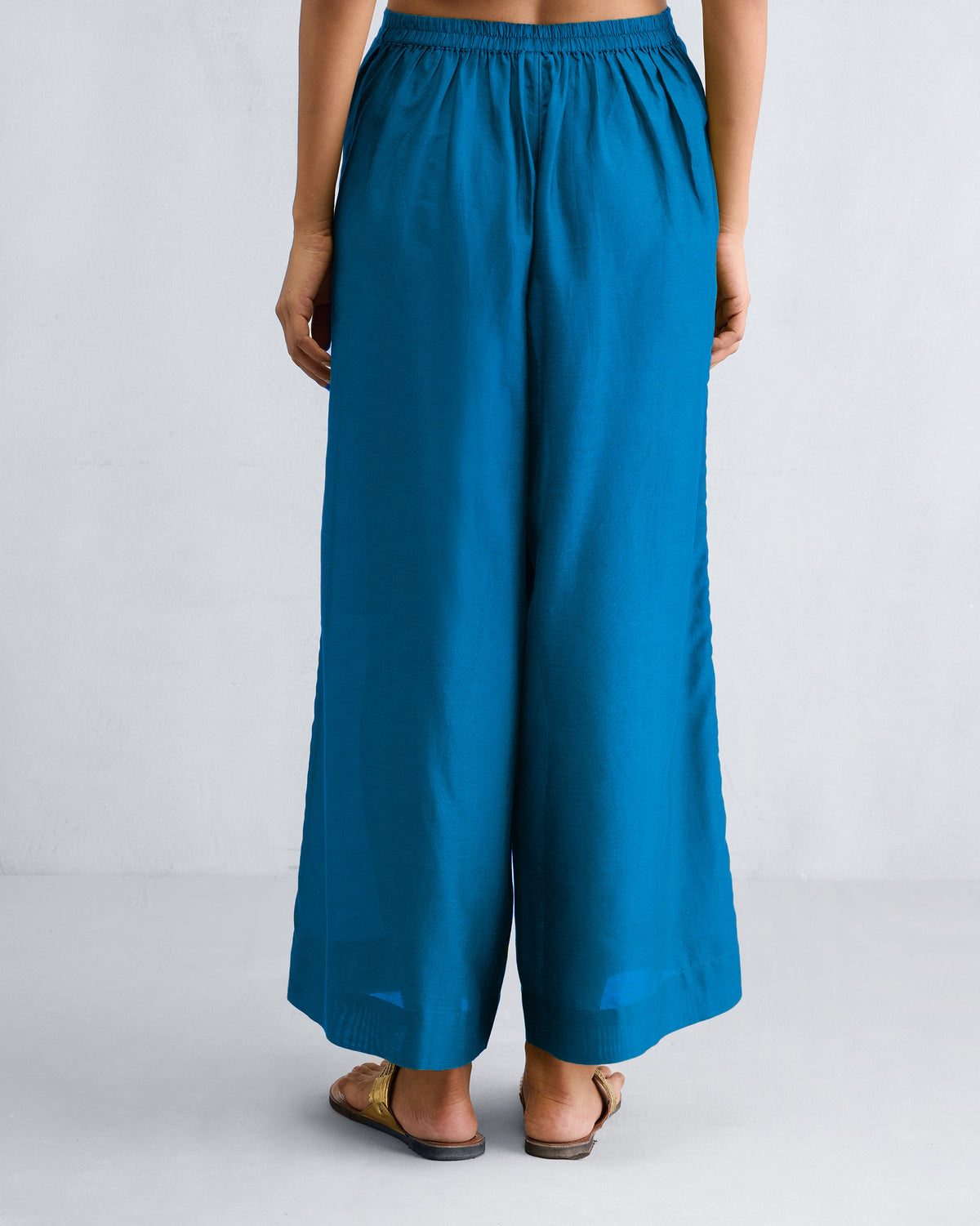 Back of sapphire Basic Pyjamas with an elastic waistband.