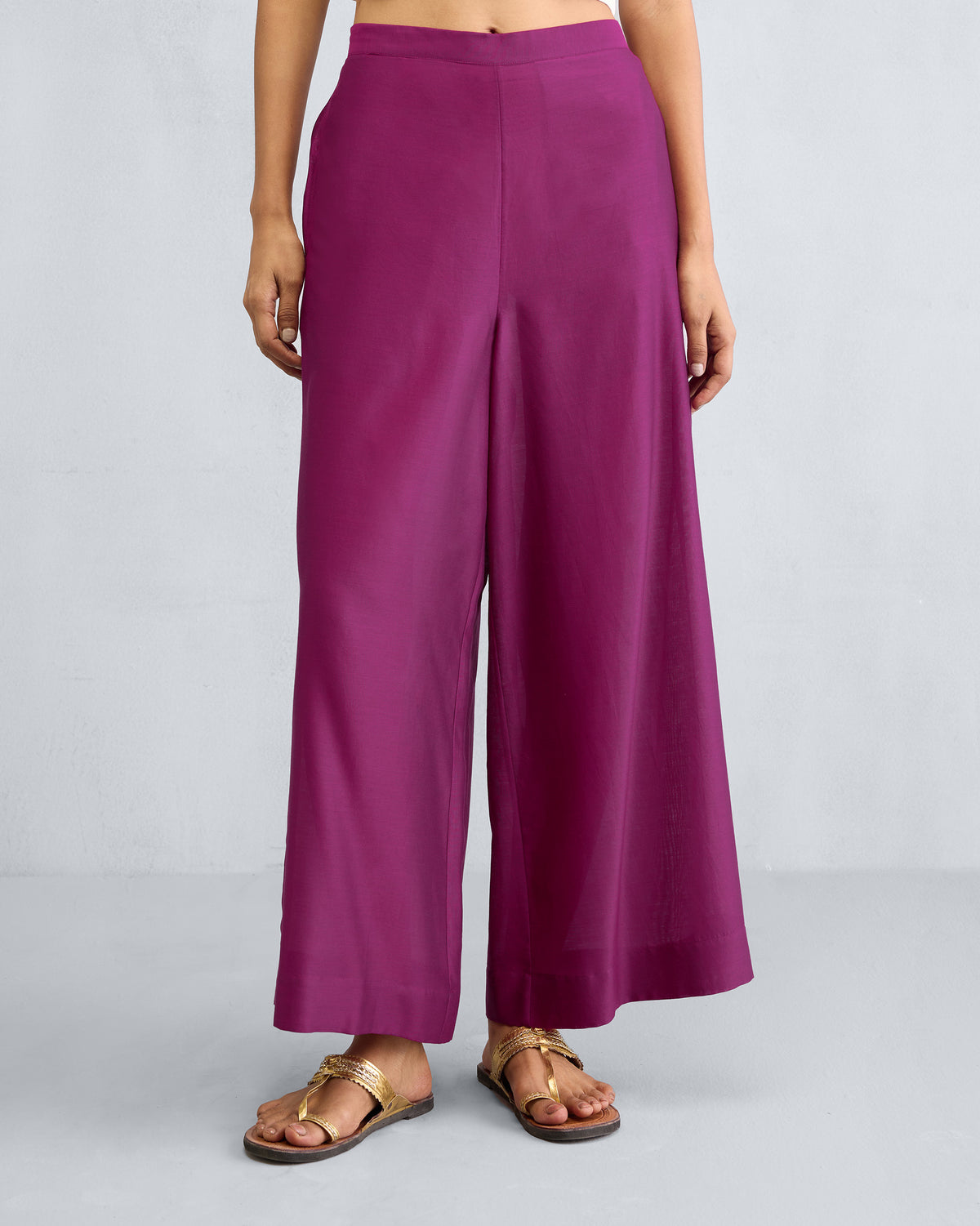 Person wearing mulberry Basic Pyjamas with wide legs.