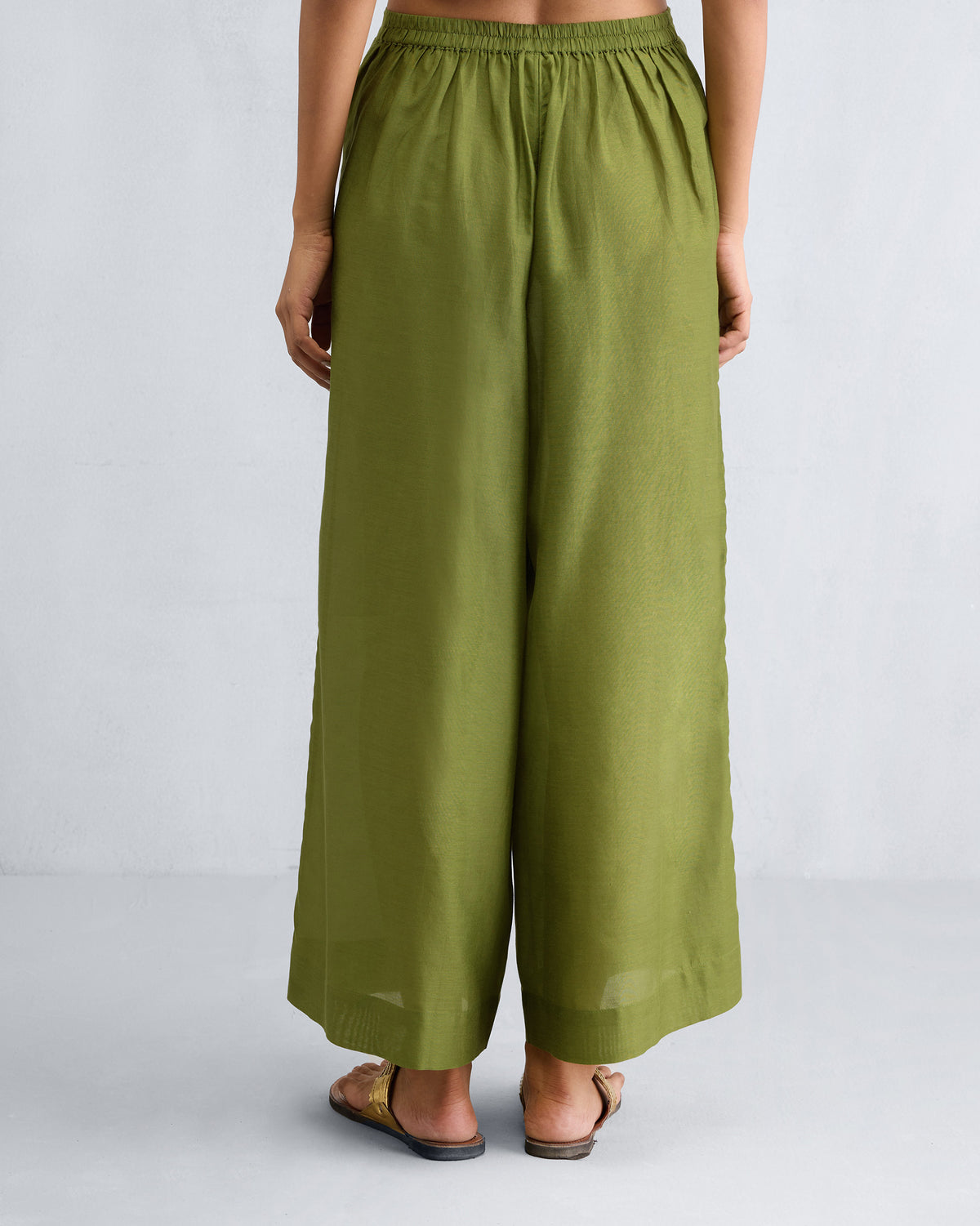 Back of olive Basic Pyjamas with an elastic waistband.