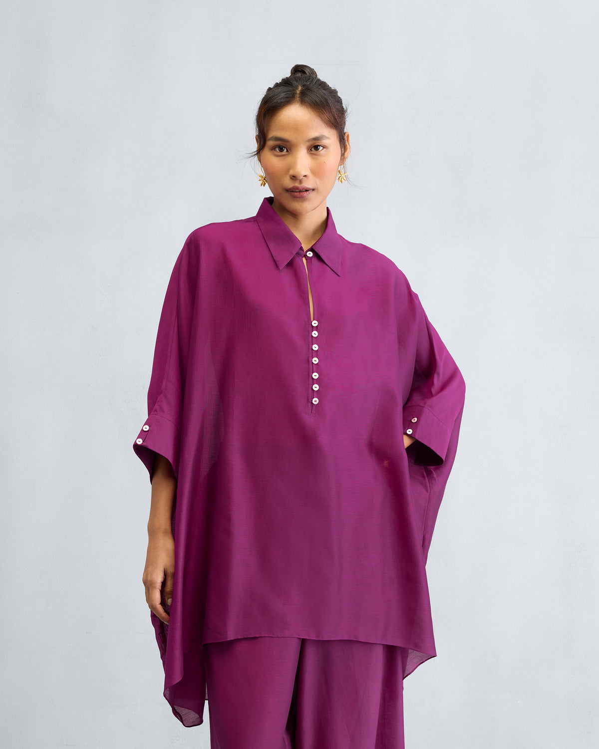 Mulberry Hala tunic with a white button placket and wide sleeves.