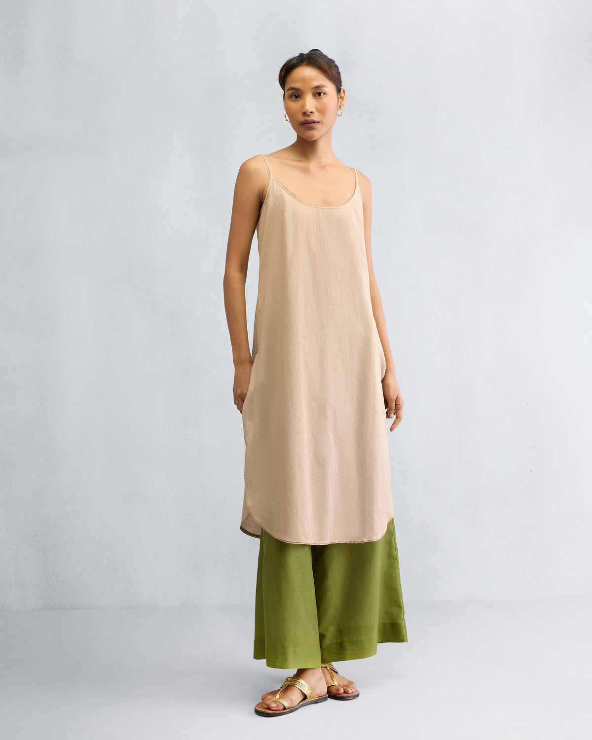 Person wearing a sand Vintage Camisole.