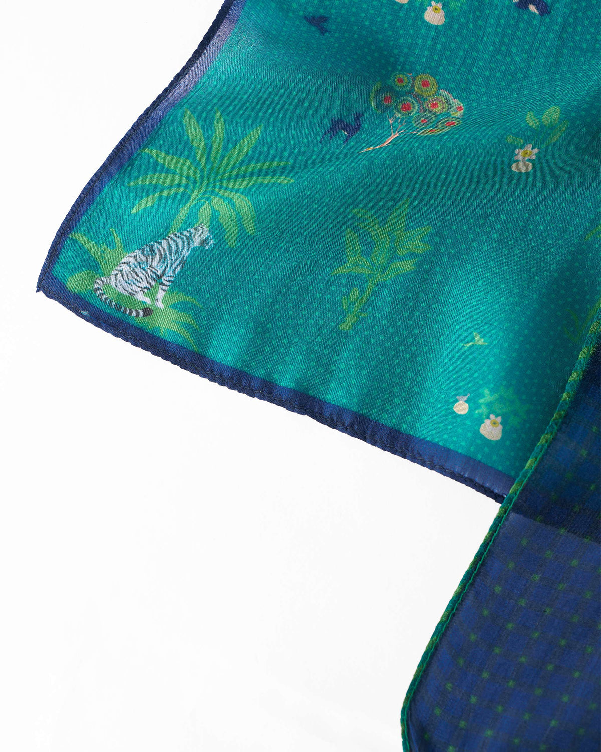 Close-up of tropical motifs on an aqua Firefly Pocket Square.