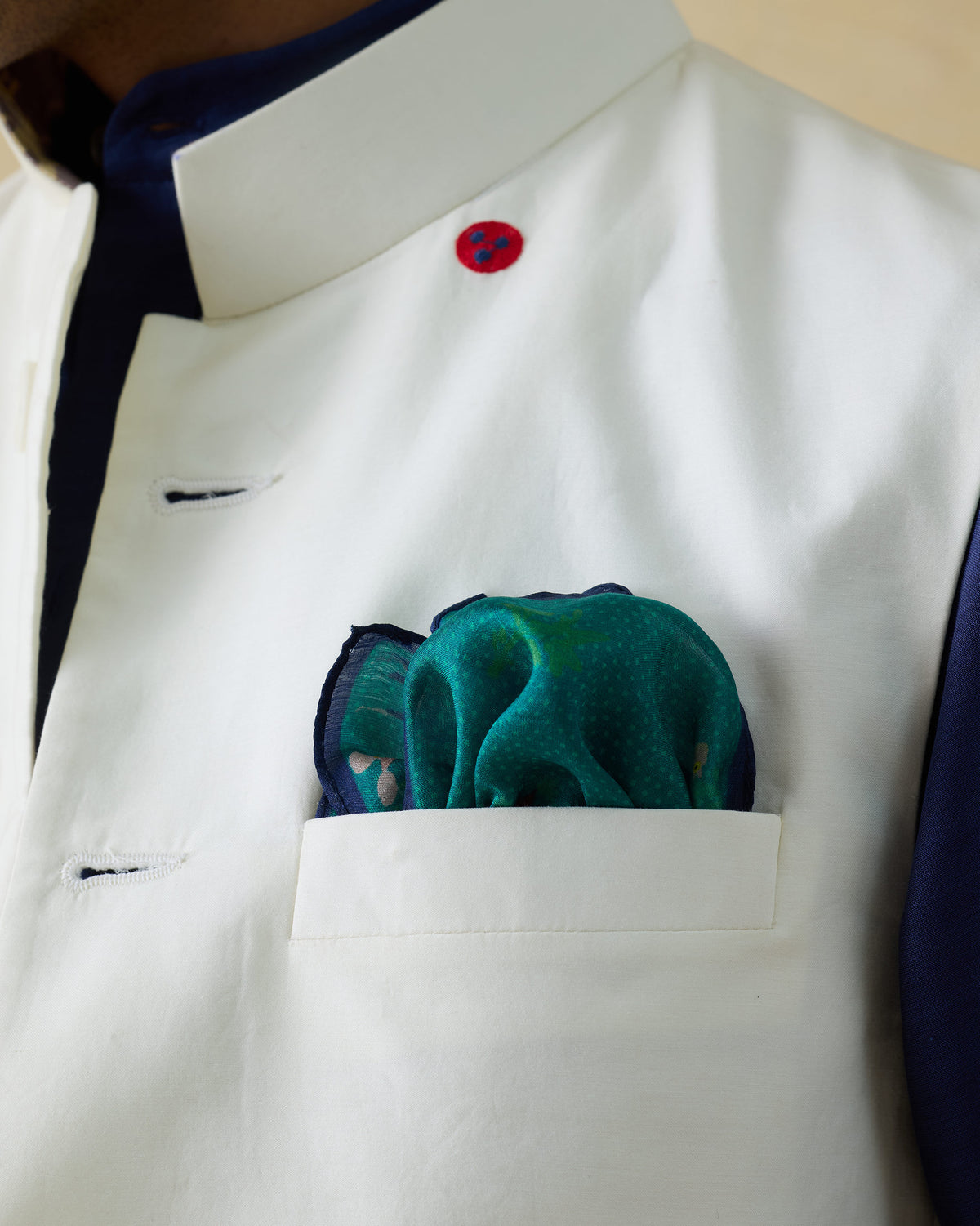 Aqua Firefly Pocket Square worn in a jacket pocket.