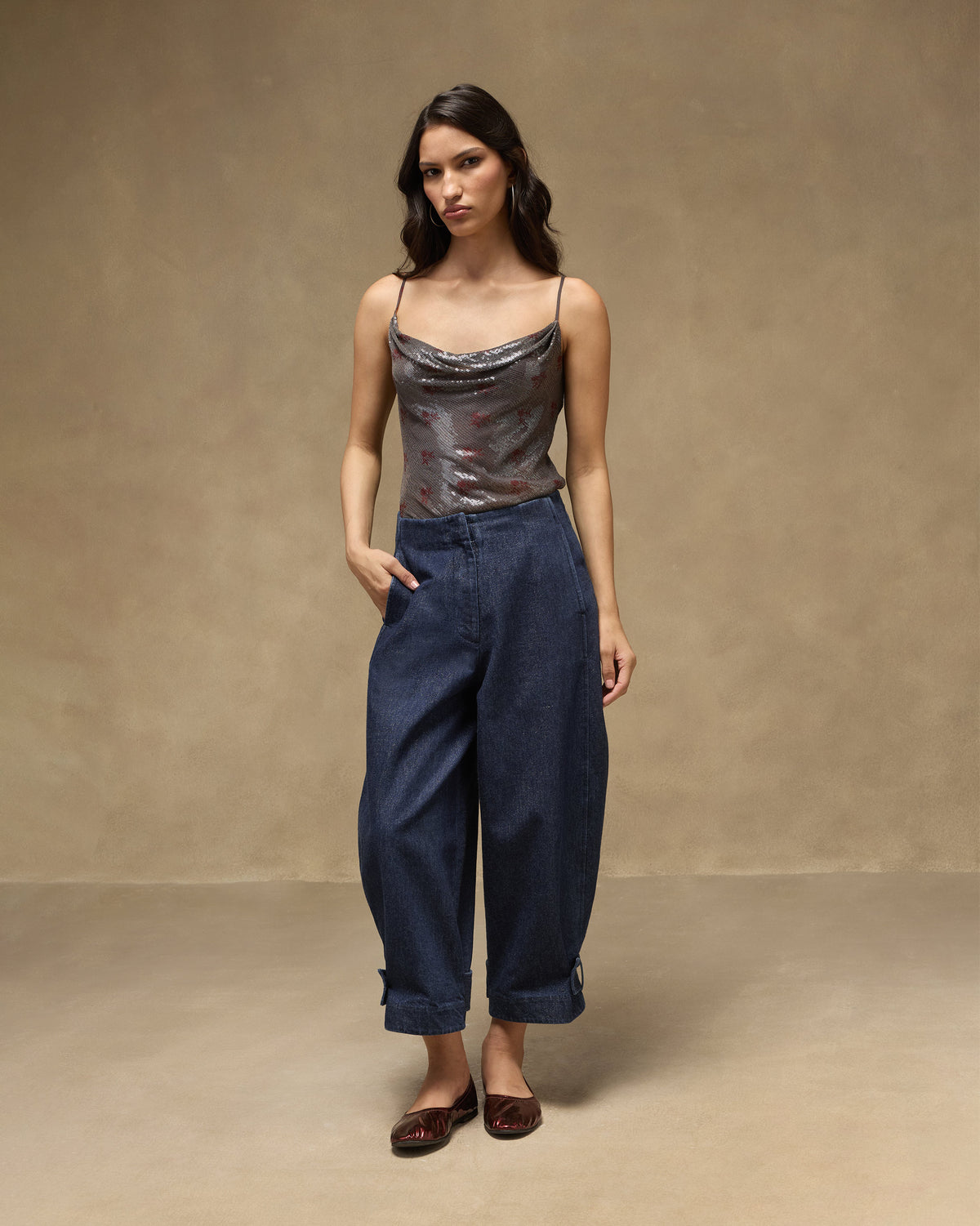 Person wearing navy Groove Pants in a relaxed wide-leg denim fit.