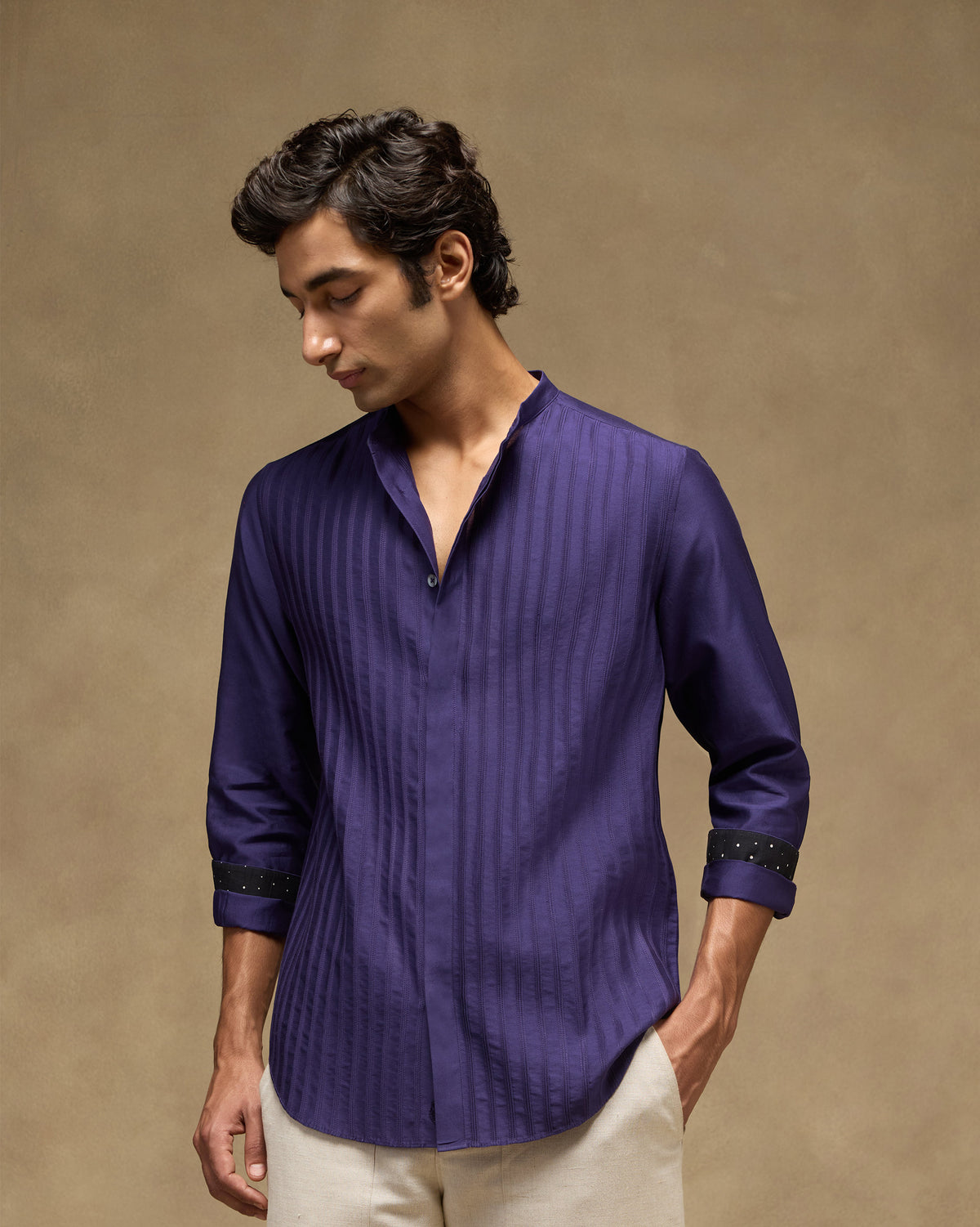 Sundown Shirt worn full length in deep purple with vertical pintucks.