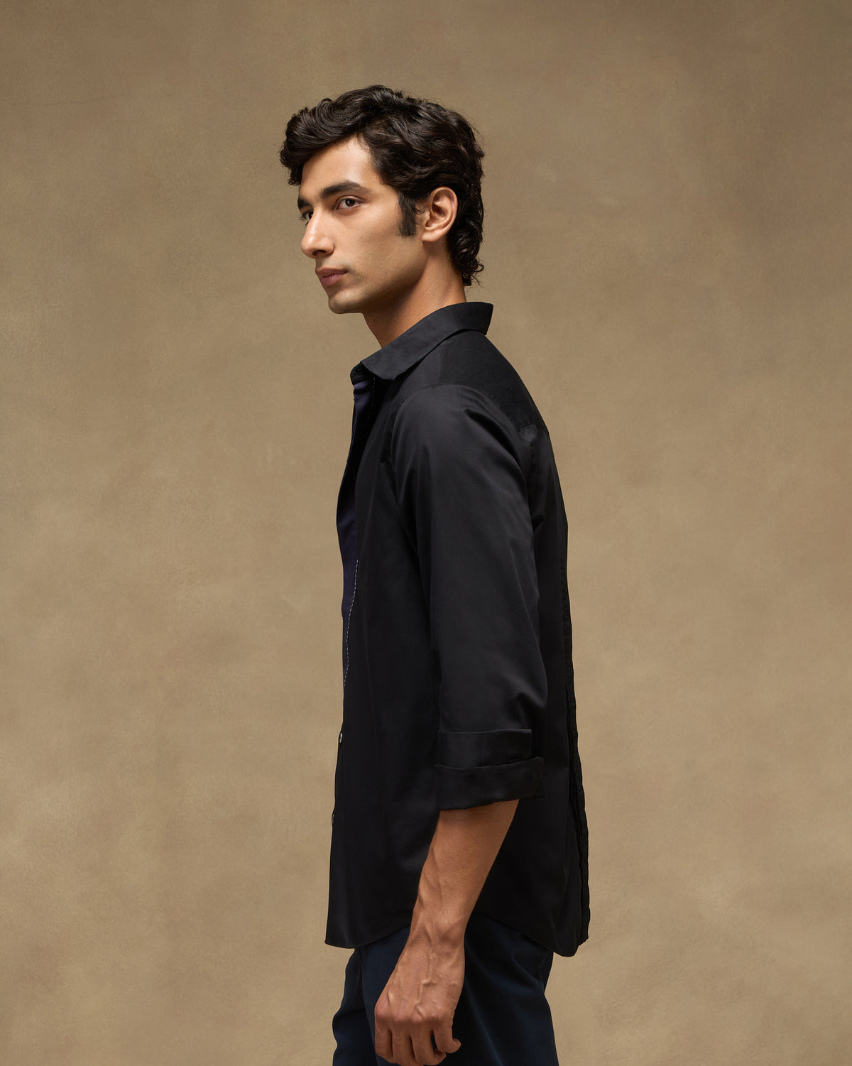 Side view of a black Midnight Shirt.