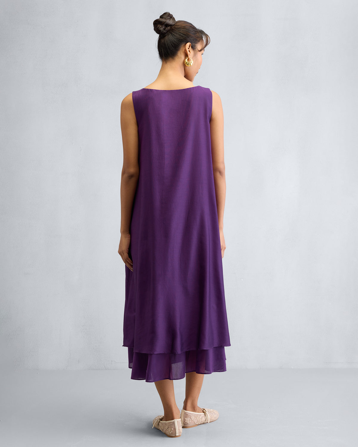 Back of a purple Chanderi A-line Double layer dress worn by a person.