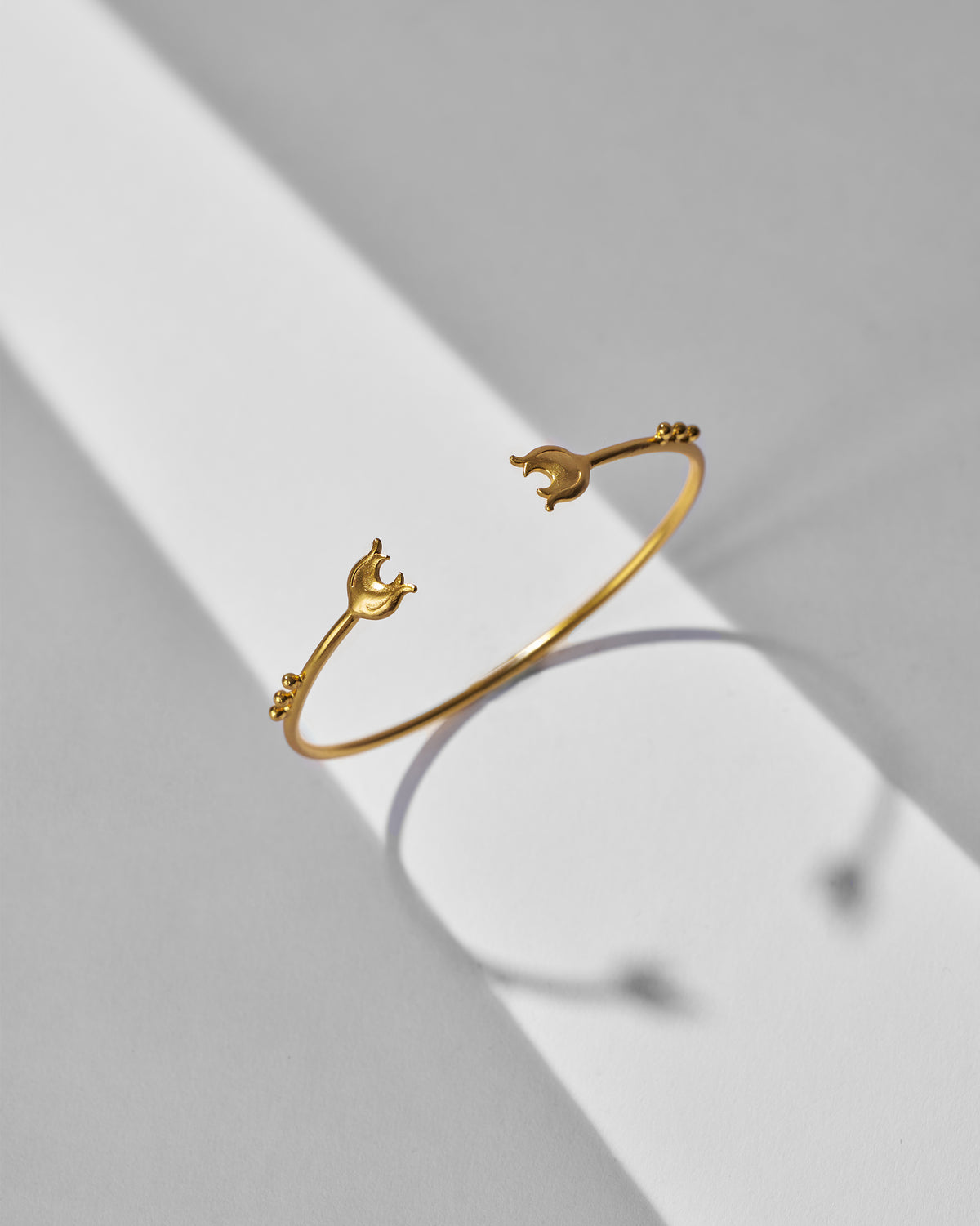 Chaandphool Cuff shown open, with crescent-shaped ends and small bead details.