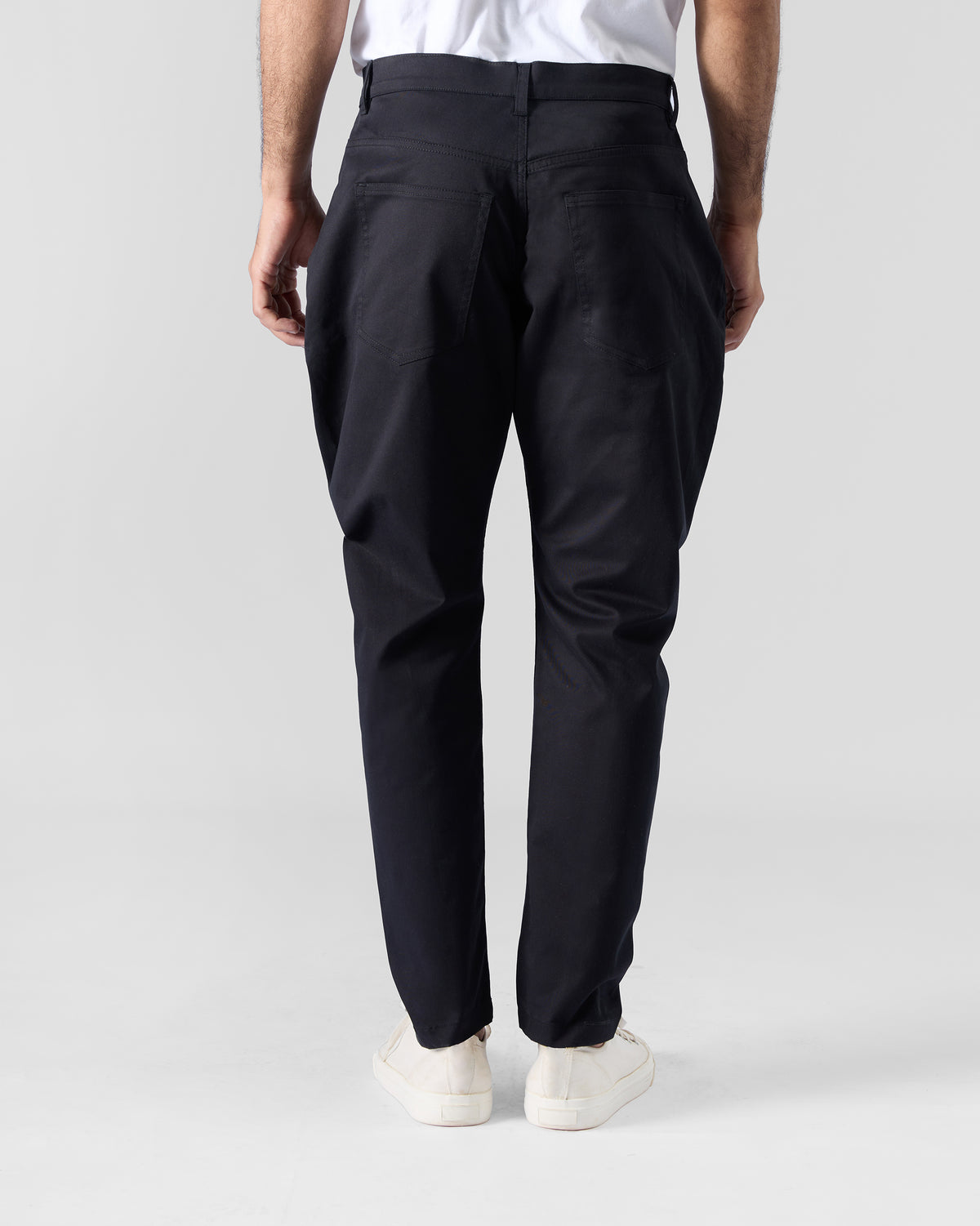 Back of black Serow jodhpur pants with patch pockets.