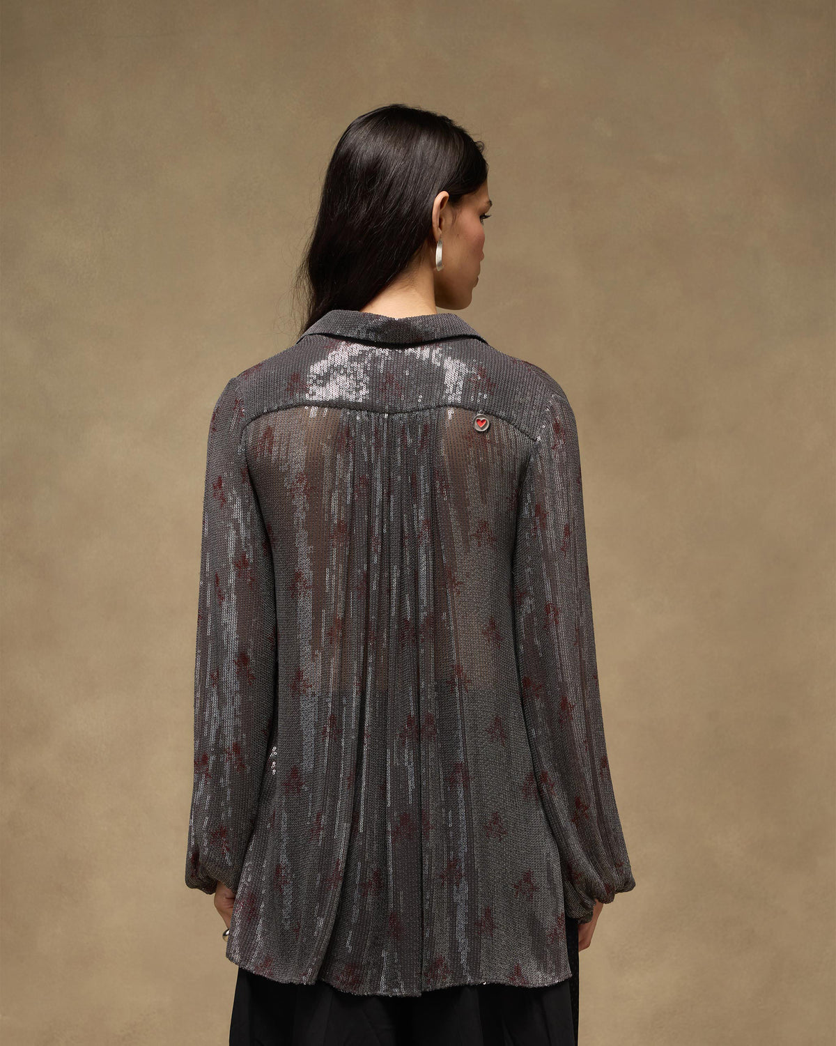Back of a charcoal Bacchus shirt with sequin stripes and back pleats.