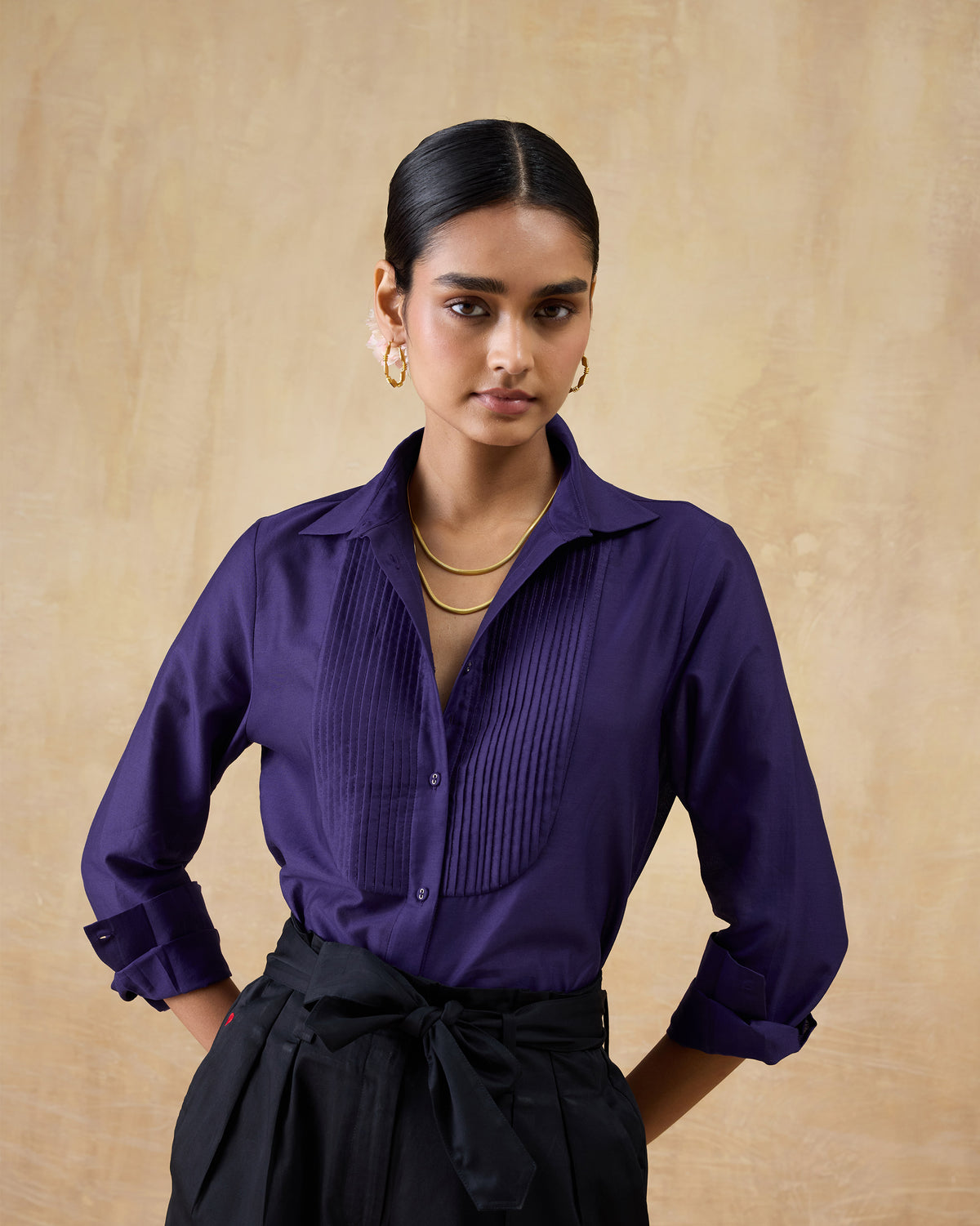 Person wearing a purple Tuxedo Shirt with a pintuck bib front.