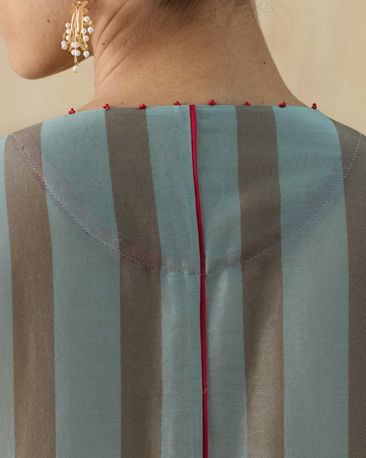 Close-up of the Midnight Club kurta back neckline with a red centre seam.