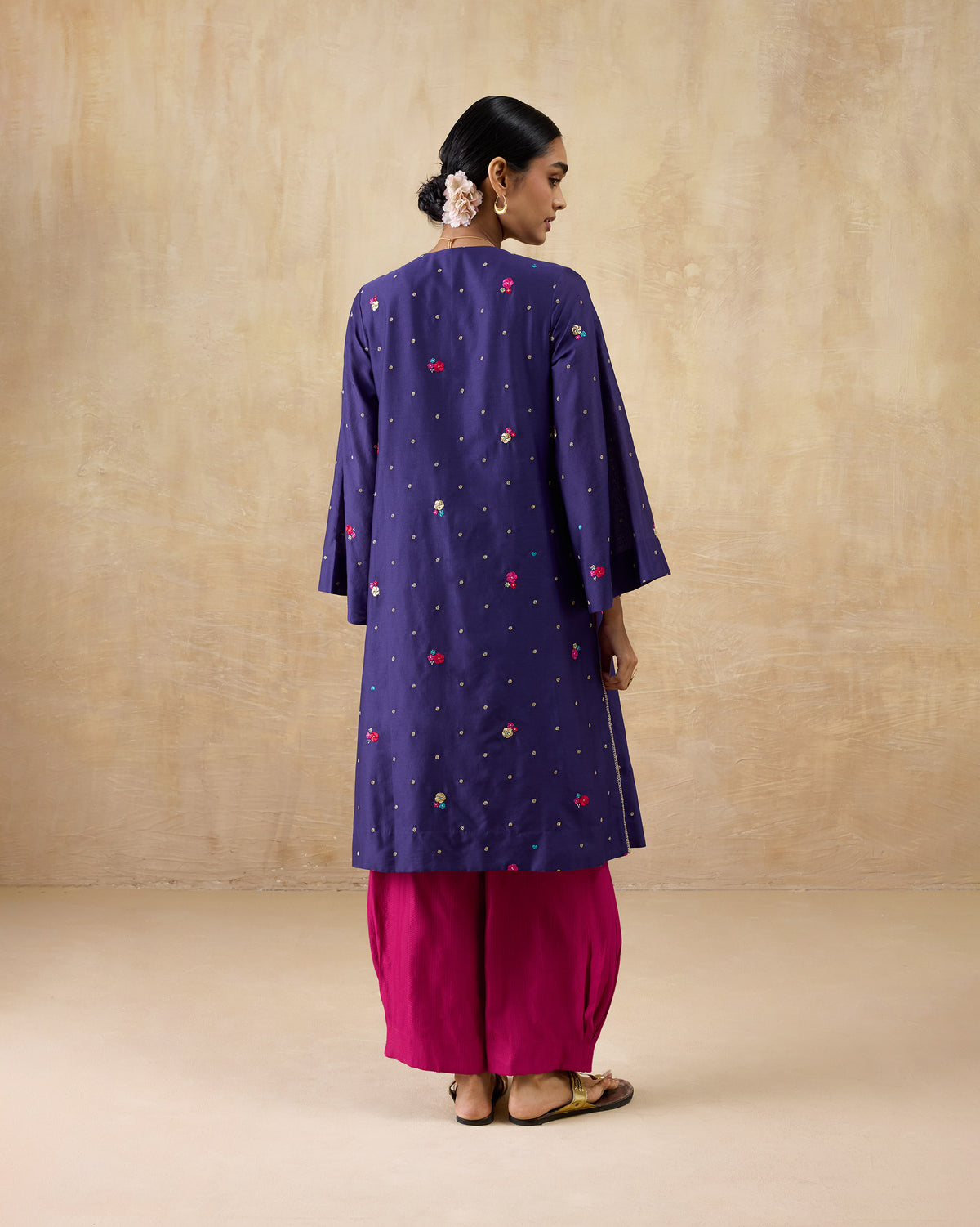 Back of a purple embroidered Nebula kurta.