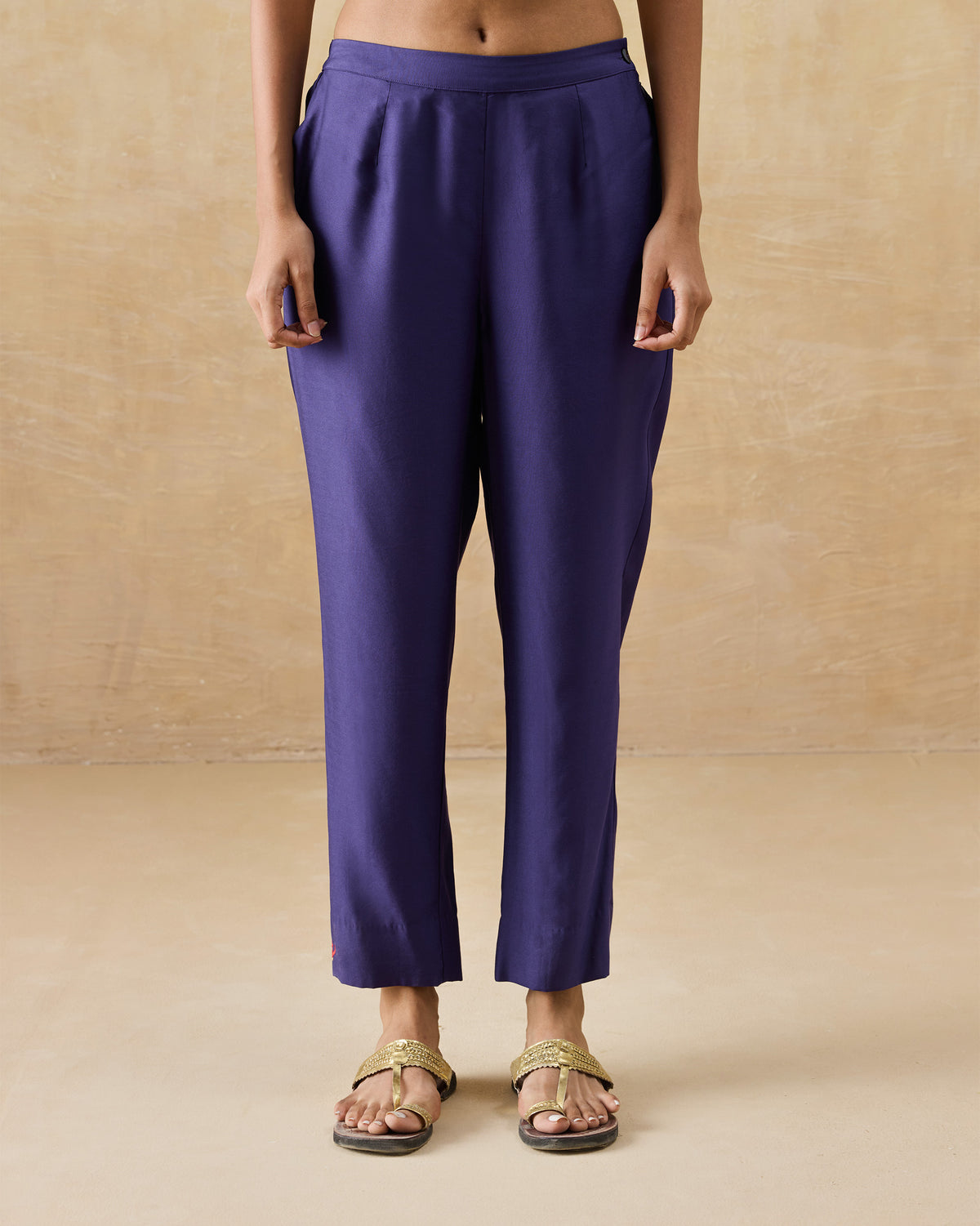 Purple Darjeeling pants with a narrow tapered leg.