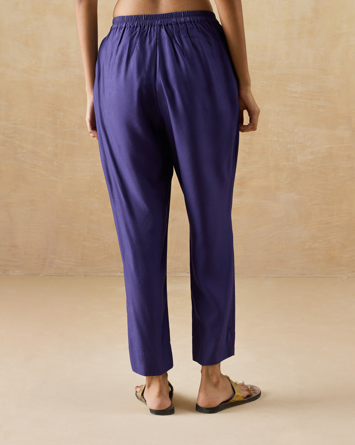 Back of purple Darjeeling pants with a gathered elastic waist.