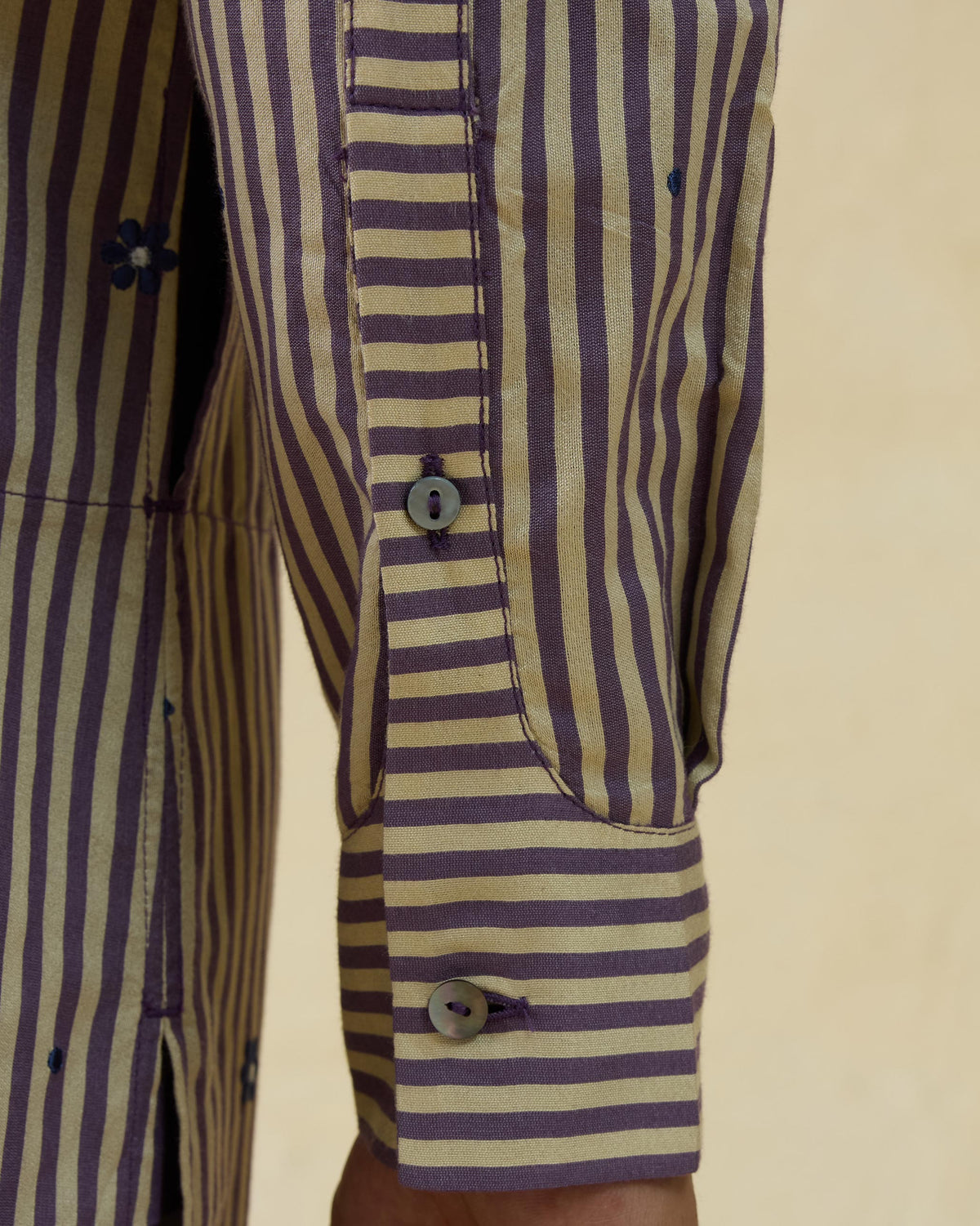 Close-up of a Shaam Kurta cuff where the stripes change direction.