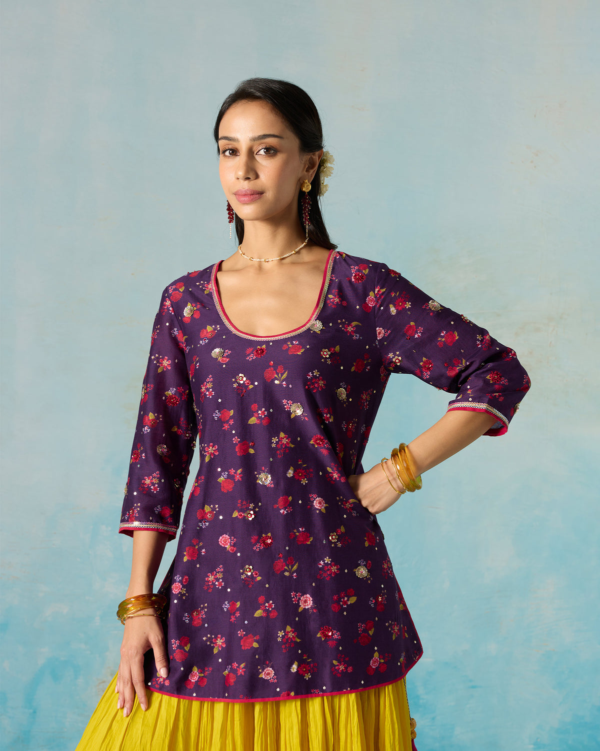 Full-length view of a purple Sehra kurti worn by a person.