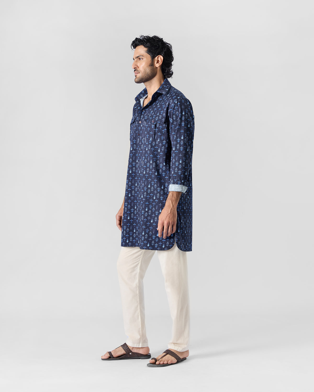 Side view of a dark blue Hawai Sa Kurta worn by a person.