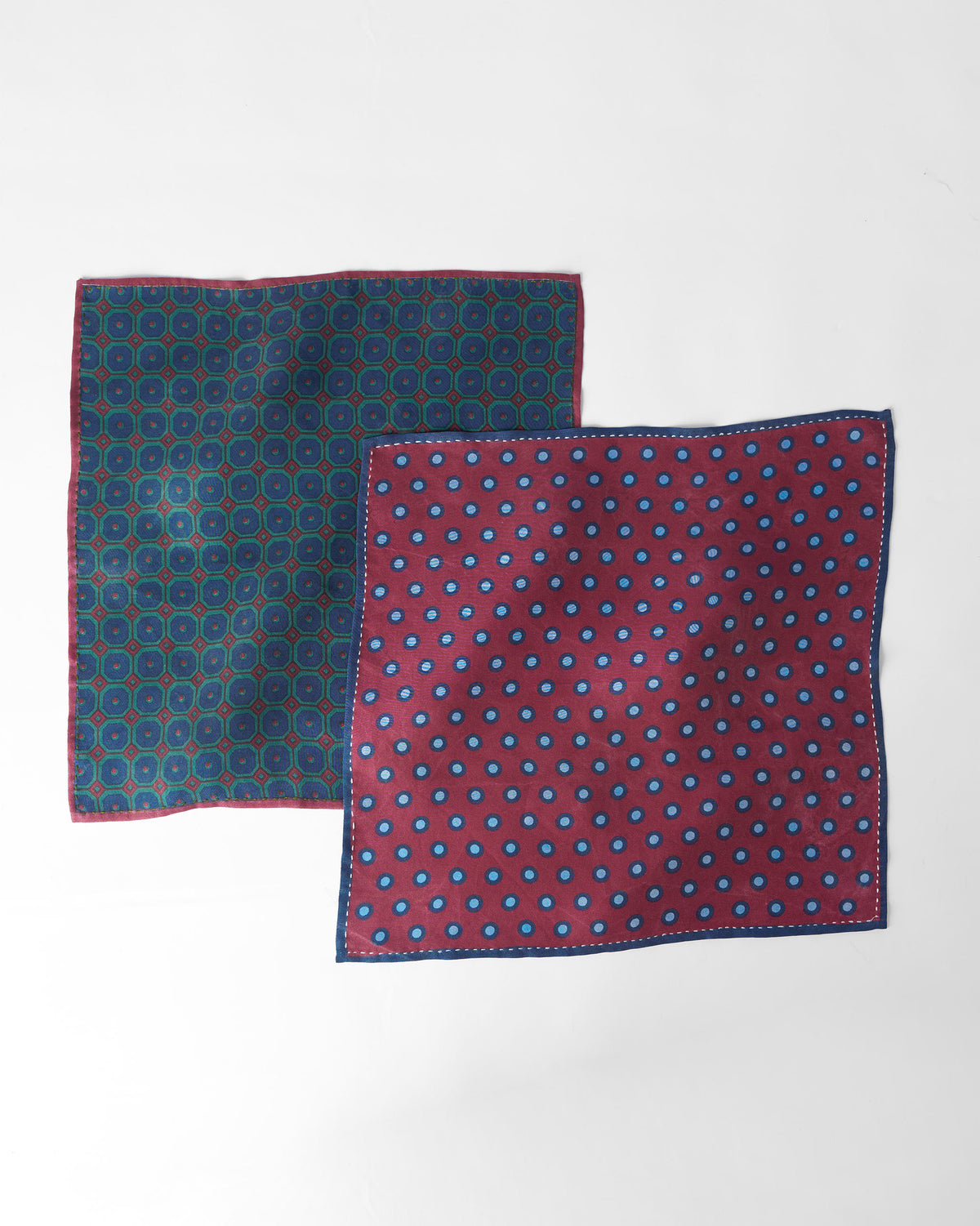 Pair of multicolour Pipit silk pocket squares laid flat.