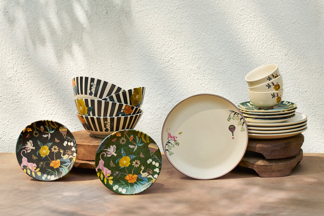 Myra Quarter Plate in charcoal shown with other Myra bowls and plates.